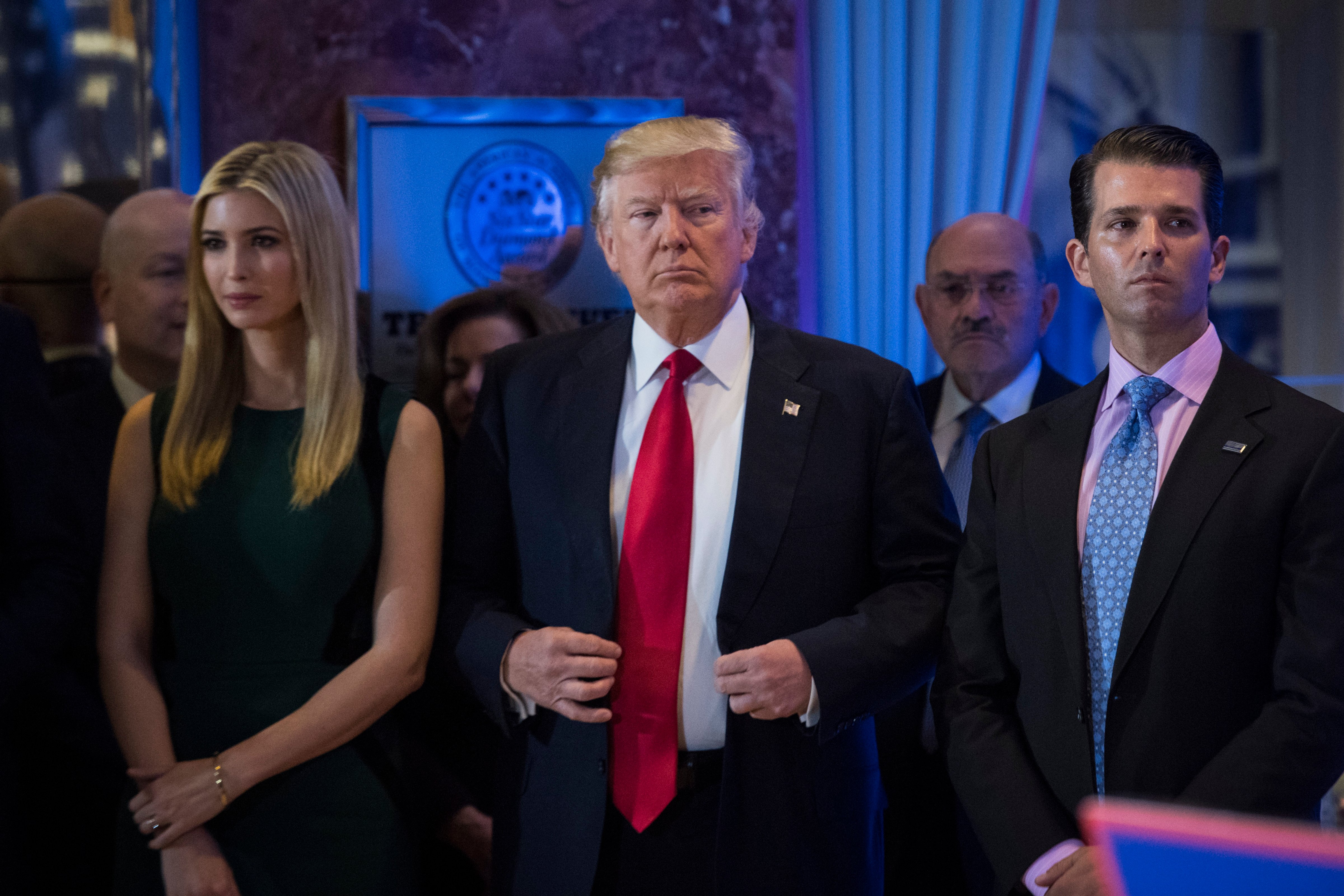 President-elect Donald Trump, Ivanka Trump, and Donald Trump Jr., listen during a press conference at Trump Tower in New York, NY on Wednesday, Jan. 11, 2017. (Jabin Botsford—The Washington Post/Getty Images)