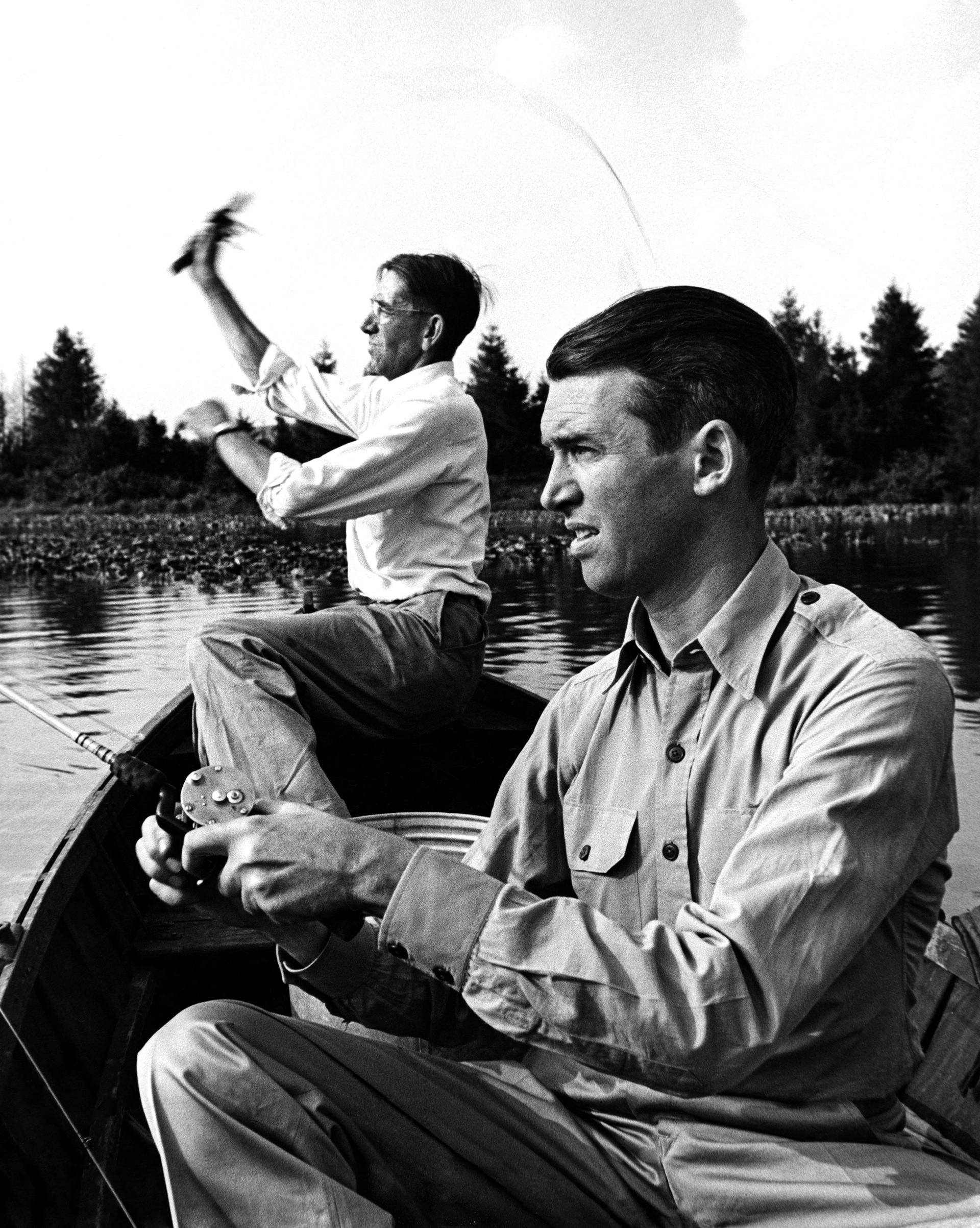 Jimmy Stewart (R) bass fishing with his friend Clyde "Woodie" Woodward, upon his return from WWII, 1945.