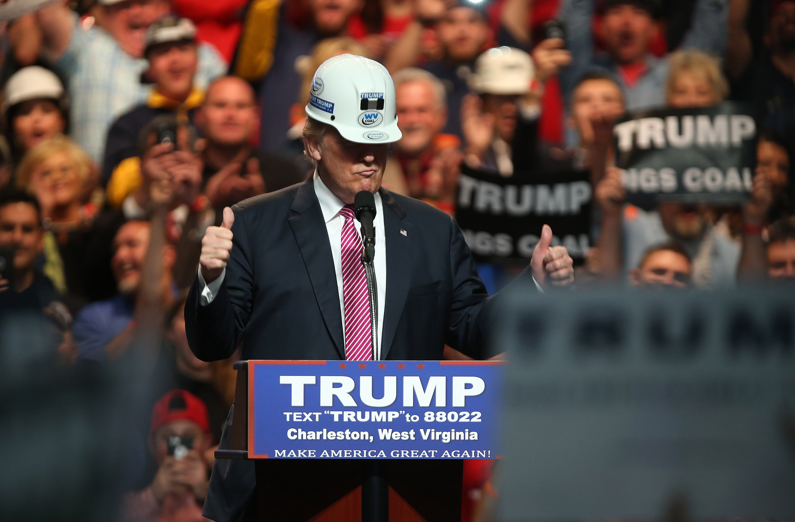 Republican Presidential candidate Donald Trump models a hard hat in support of the miners during his rally at the Charleston Civic Center on May 5, 2016 in Charleston, West Virginia. (Mark Lyons—Getty Images)