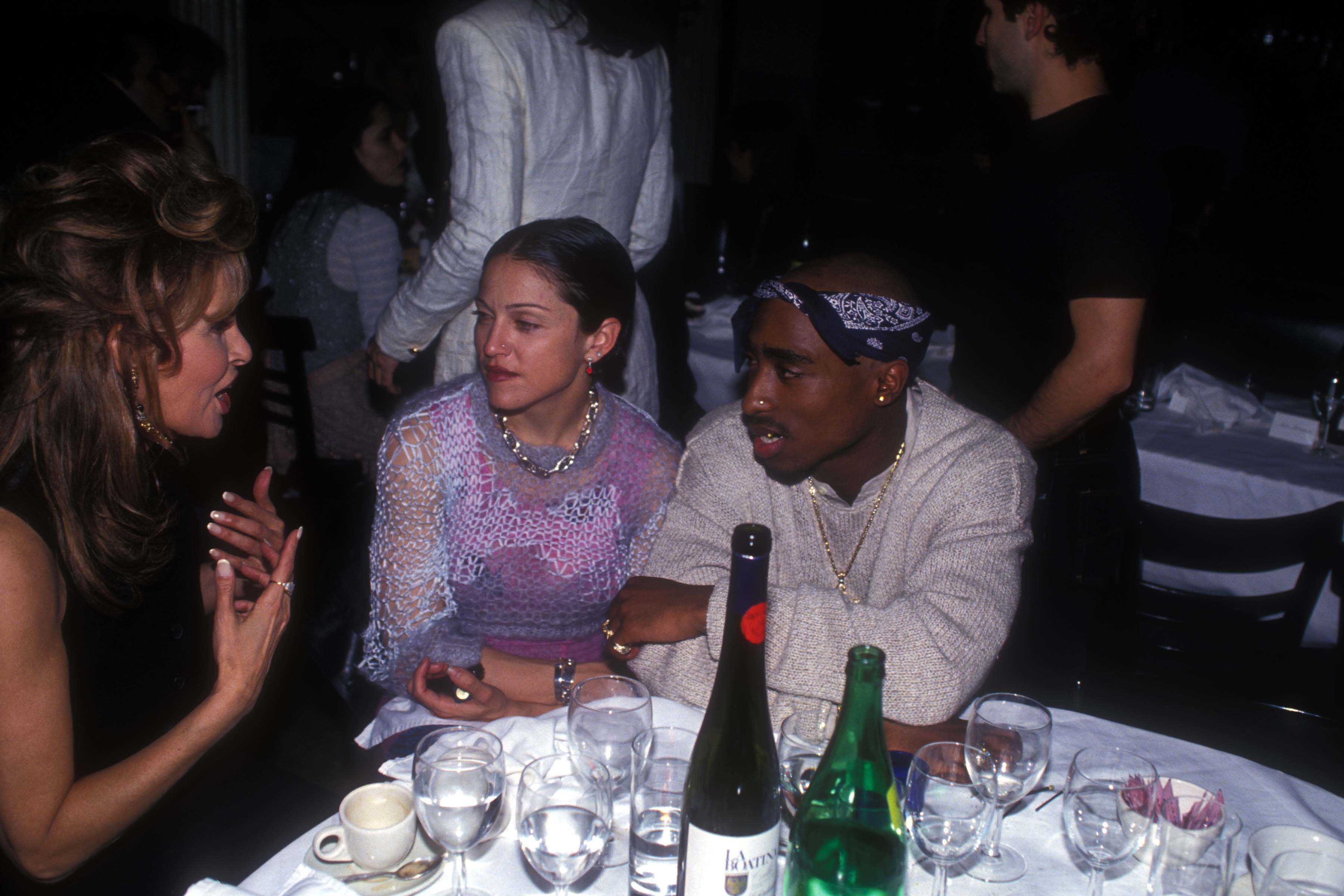 (L-R) Raquel Welch, Madonna and Tupac Shakur at the Interview Magazine party, March 1, 1994 in New York. (Patrick McMullan—Getty Images)