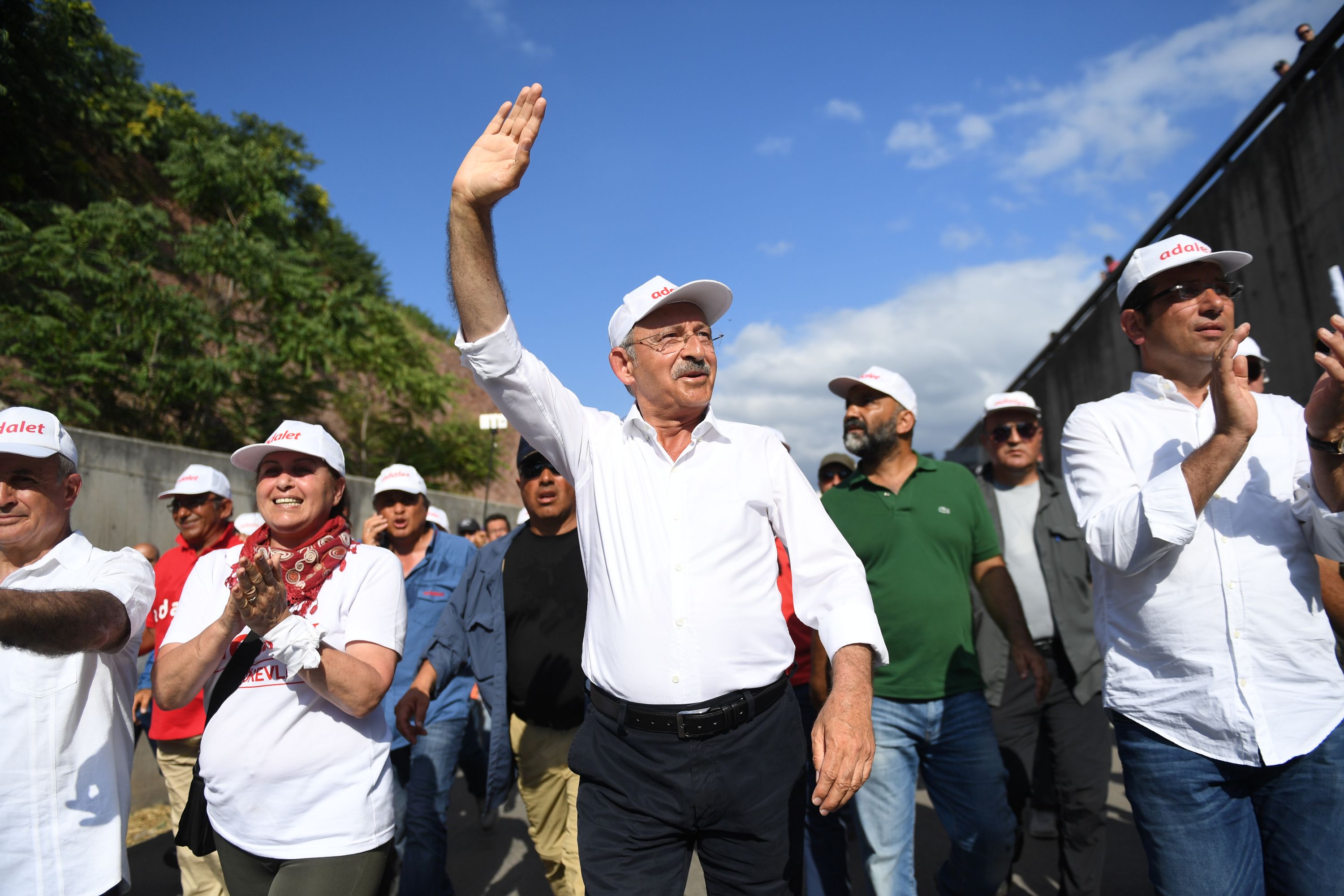 Kemal Kilicdaroglu (C), the leader of Turkey's main opposition Republican People's Party, walks with thousands of supporters on the 21st day march for justice " in Izmit, July 5, 2017 (BULENT KILIC—AFP/Getty Images)