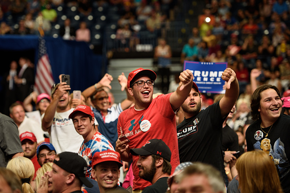 Supporters of U.S. President Donald Trump jeer the media at the Covelli Centre on July 25, 2017 in Youngstown, Ohio.