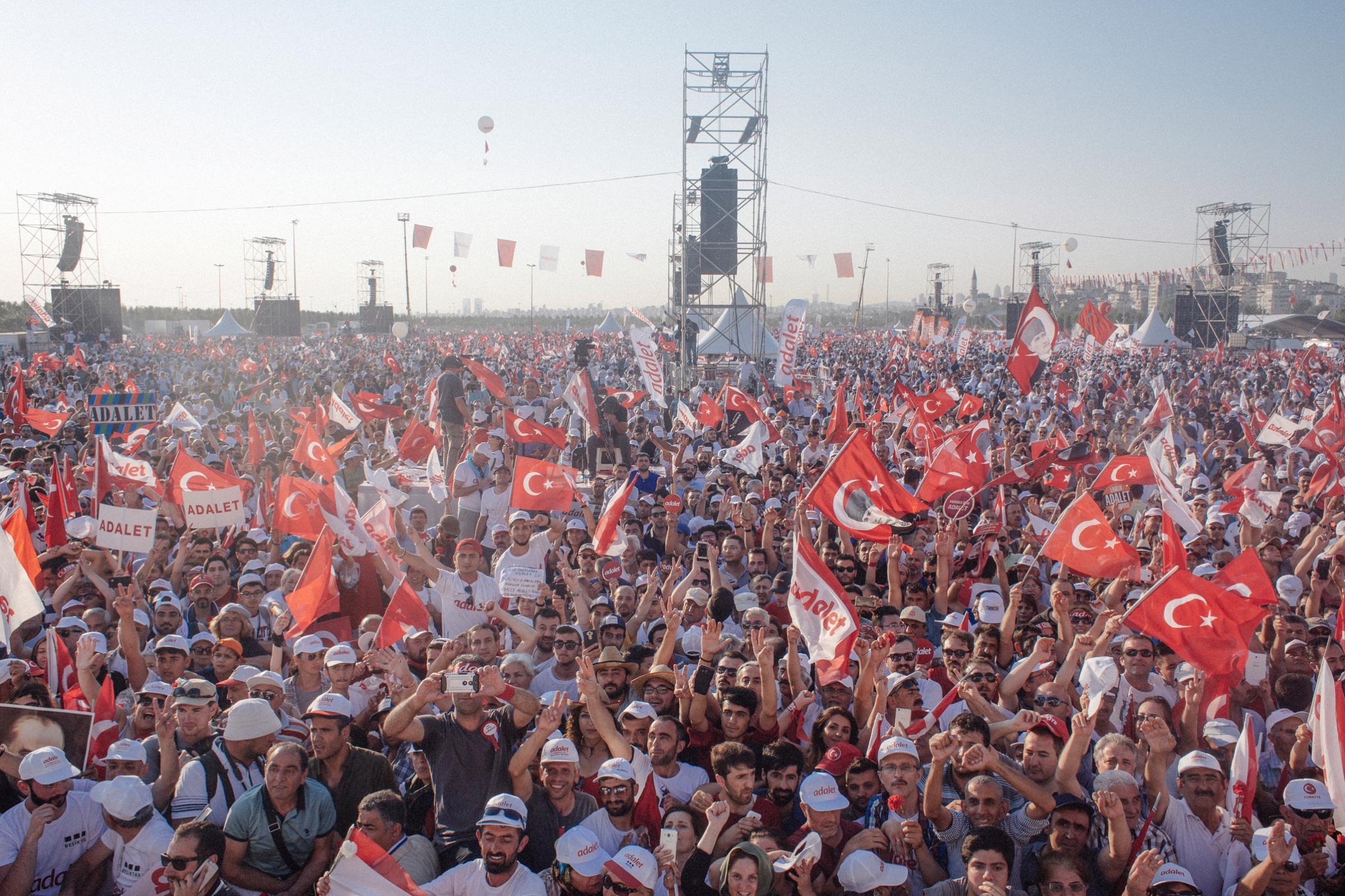 A massive crowd listens as the leader of Turkey’s mainstream opposition, Kemal Kilicdaroglu, issued a thunderous demand in Istanbul on July 9, 2017, for an end to an ongoing government crackdown under President Recep Tayyip Erdogan.