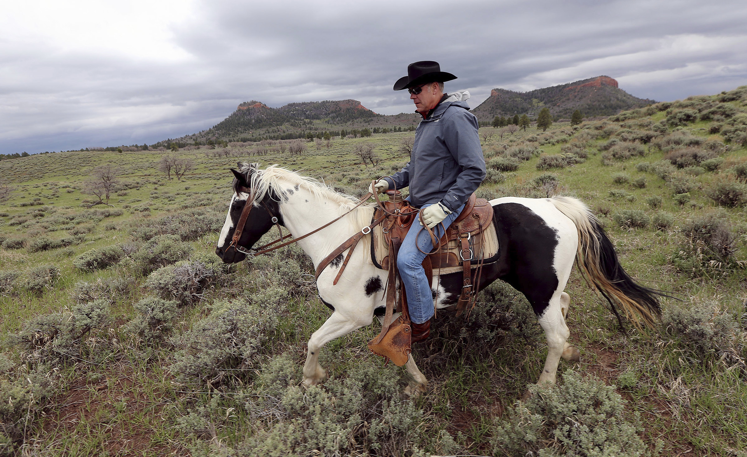 Interior Secretary Ryan Zinke rides a horse in the new Bears Ears National Monument near Blanding, Utah, on May 9, 2017. (Scott G Winterton—AP)