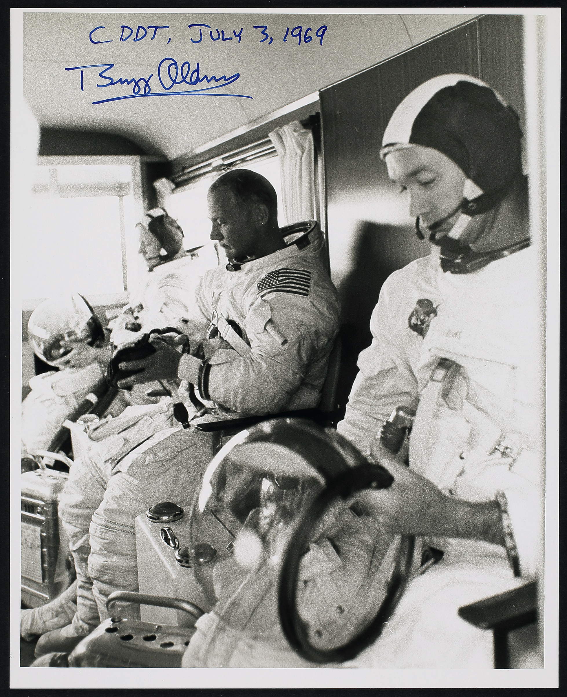NASA Apollo 11 Press Release Photograph Collection. Contains 10 photos, with 4 signed by Buzz Aldrin.