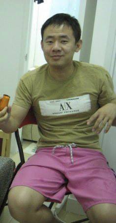 Xiyue Wang at his apartment in Hong Kong, China, 2009.