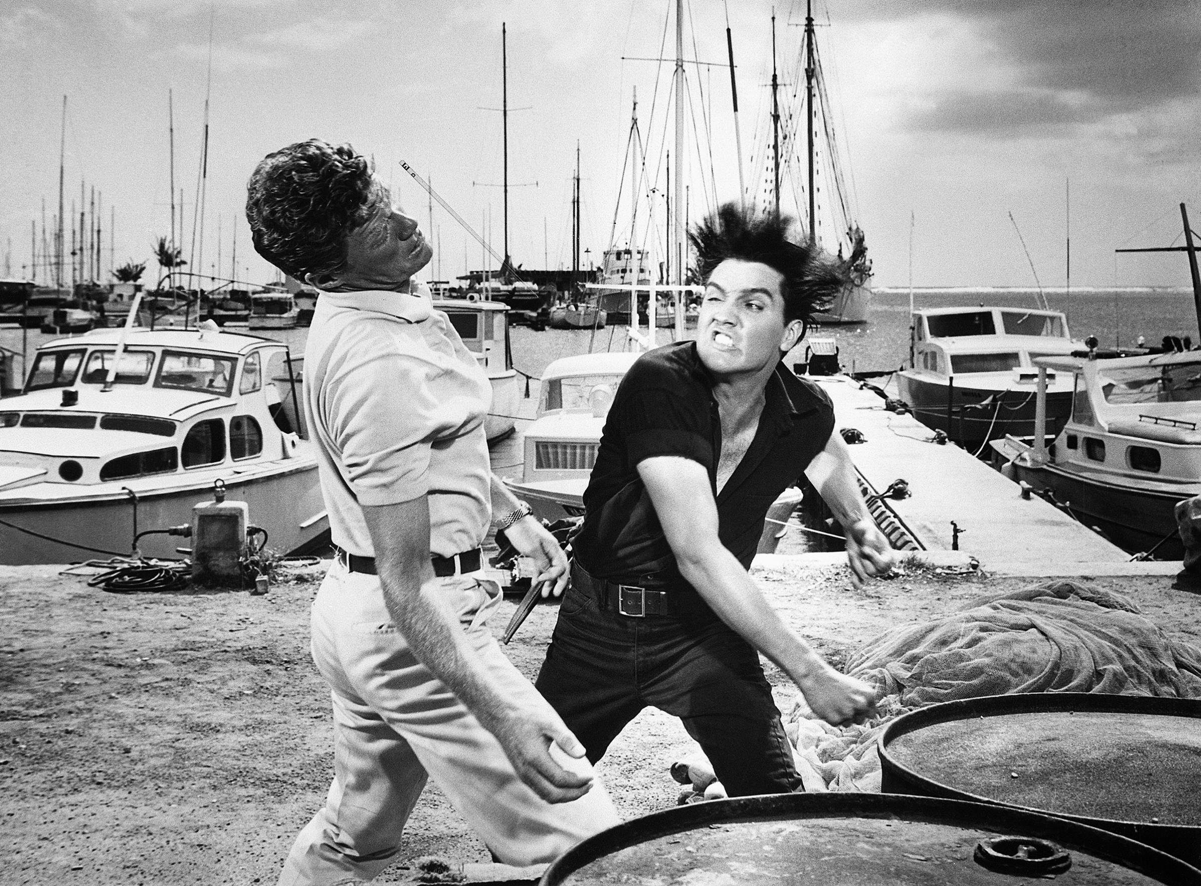 "Girls! Girls! Girls!"1962, Elvis throws a punch to Jeremy Slate on set.