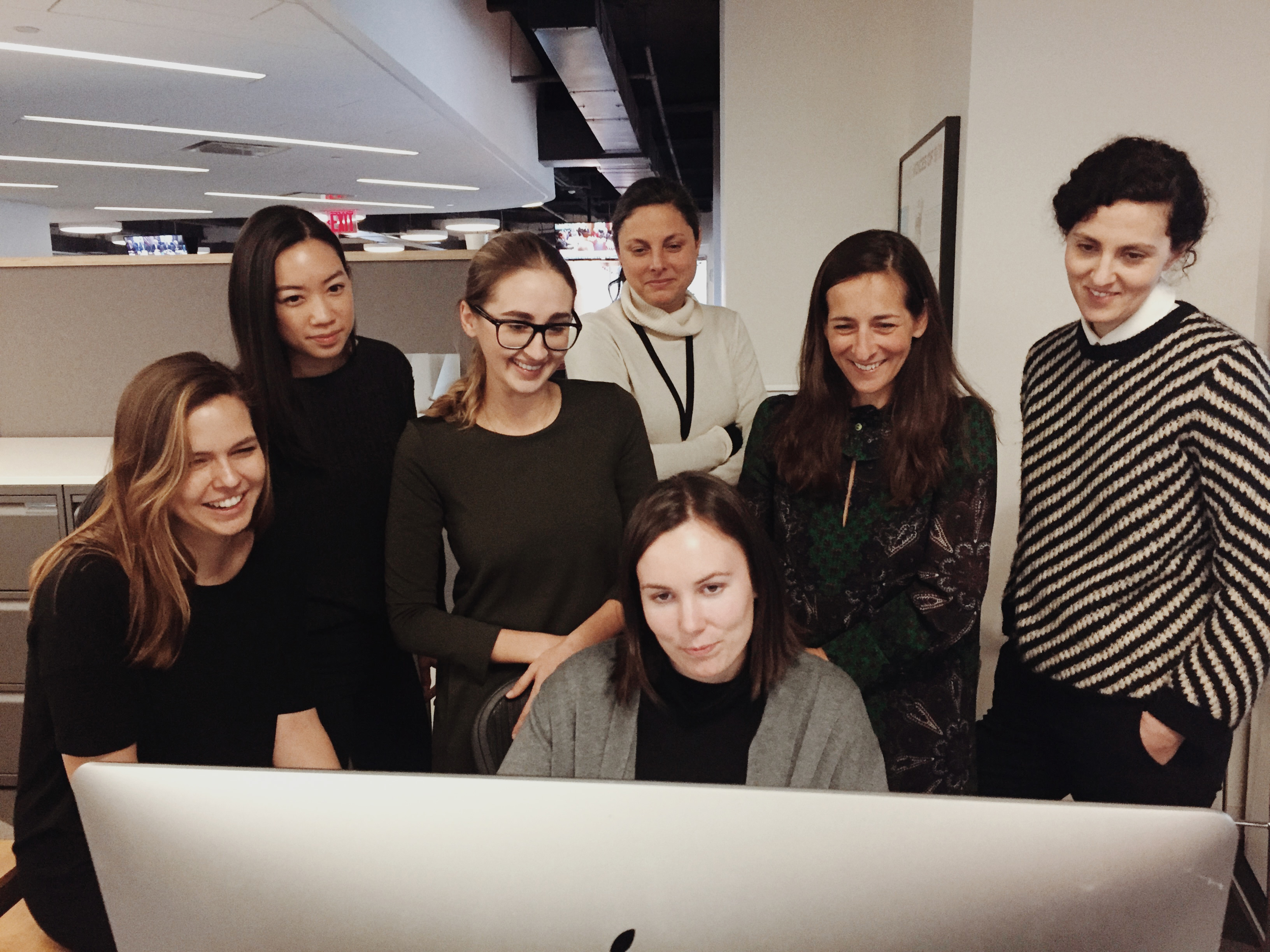 Photographer Luisa Dörr reviews a picture edit at the TIME offices with the project team (l-r): Spencer Bakalar, Diane Tsai, Luisa Dorr, Justine Simons, Tara Johnson (front center), Kira Pollack and Natalie Matutschovsky.