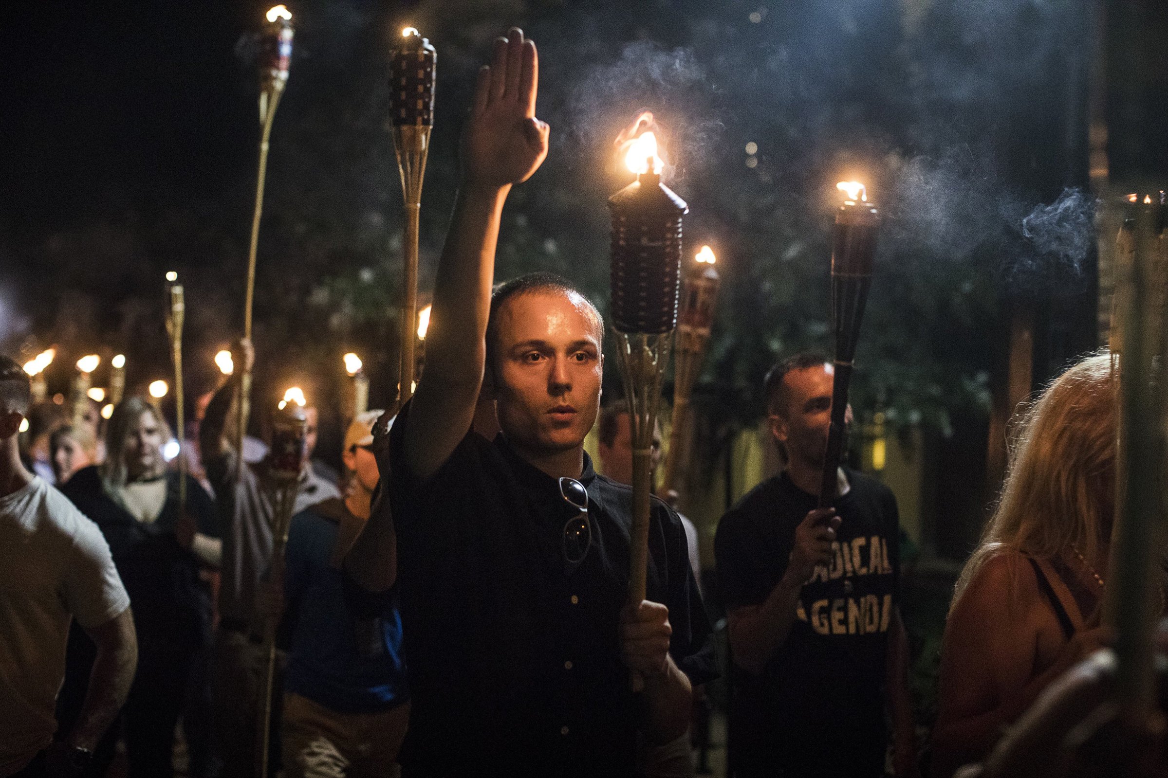 White nationalists bearing torches converge on the grounds of the University of Virginia in Charlottesville on Aug. 11