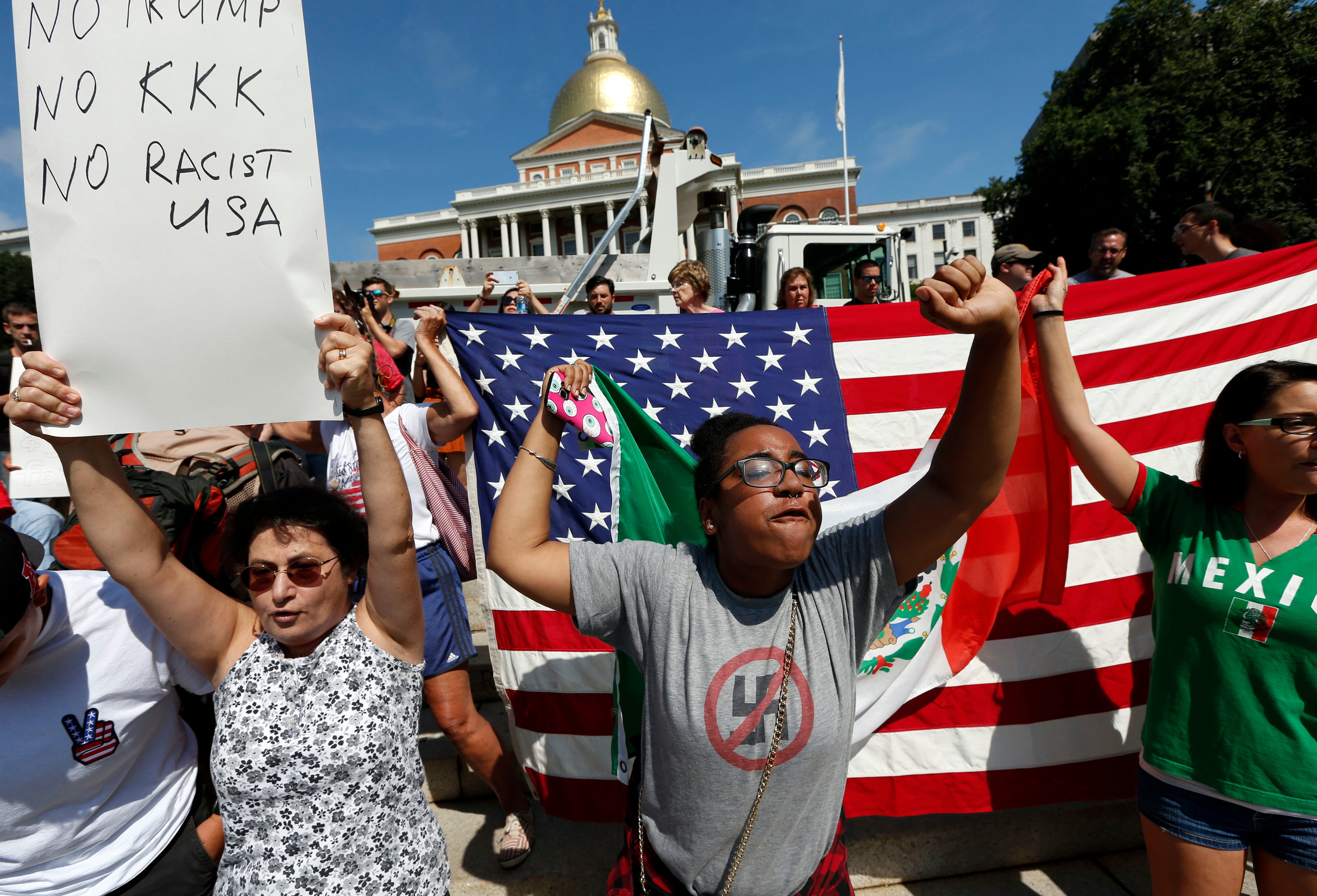 Counter-protesters at the Statehouse before a planned "Free Speech" rally by conservative organizers begins on the adjacent Boston Common on Aug. 19, 2017. (Michael Dwyer—AP)