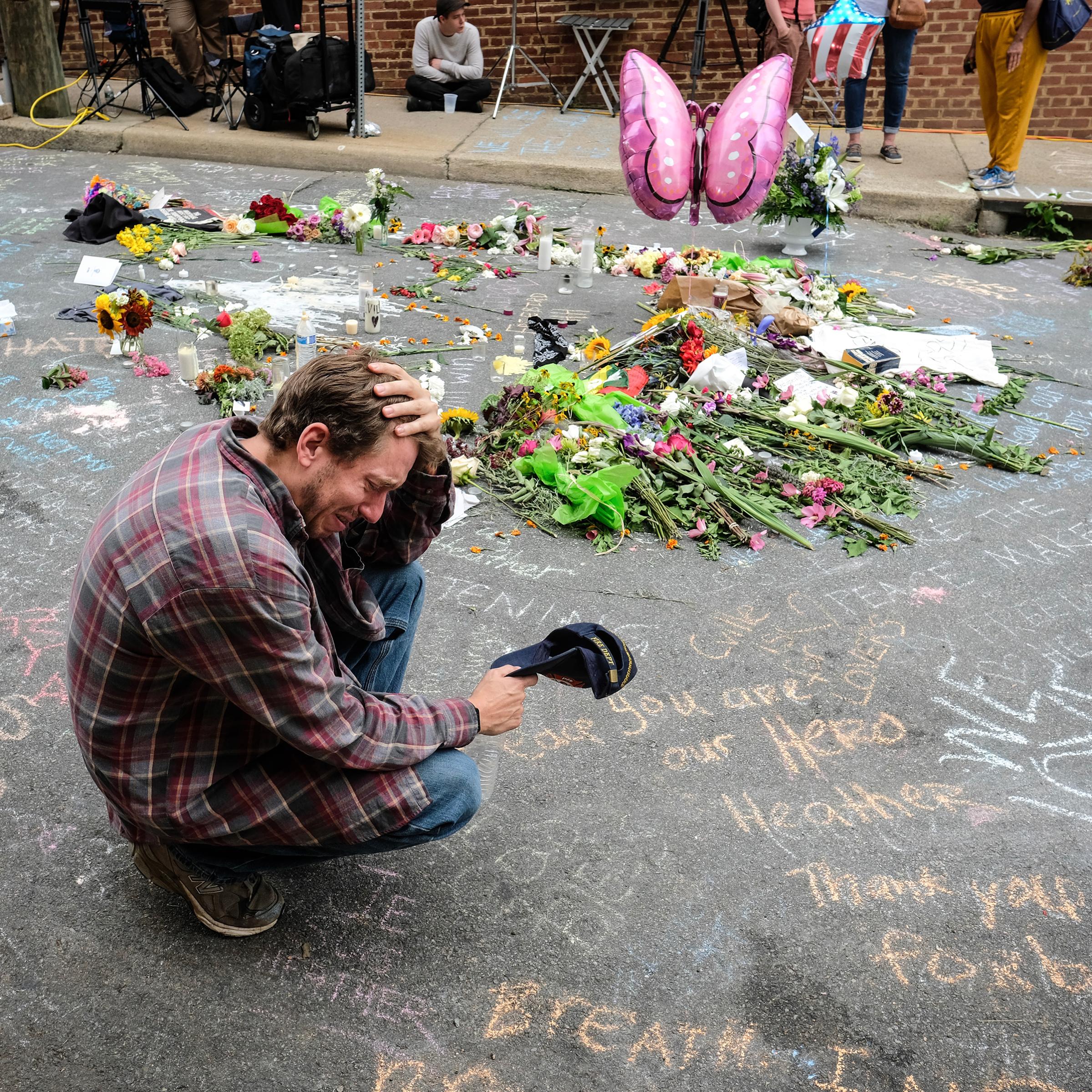 Jake Westley Anderson visits the spot where Heather Heyer died on Aug. 12.