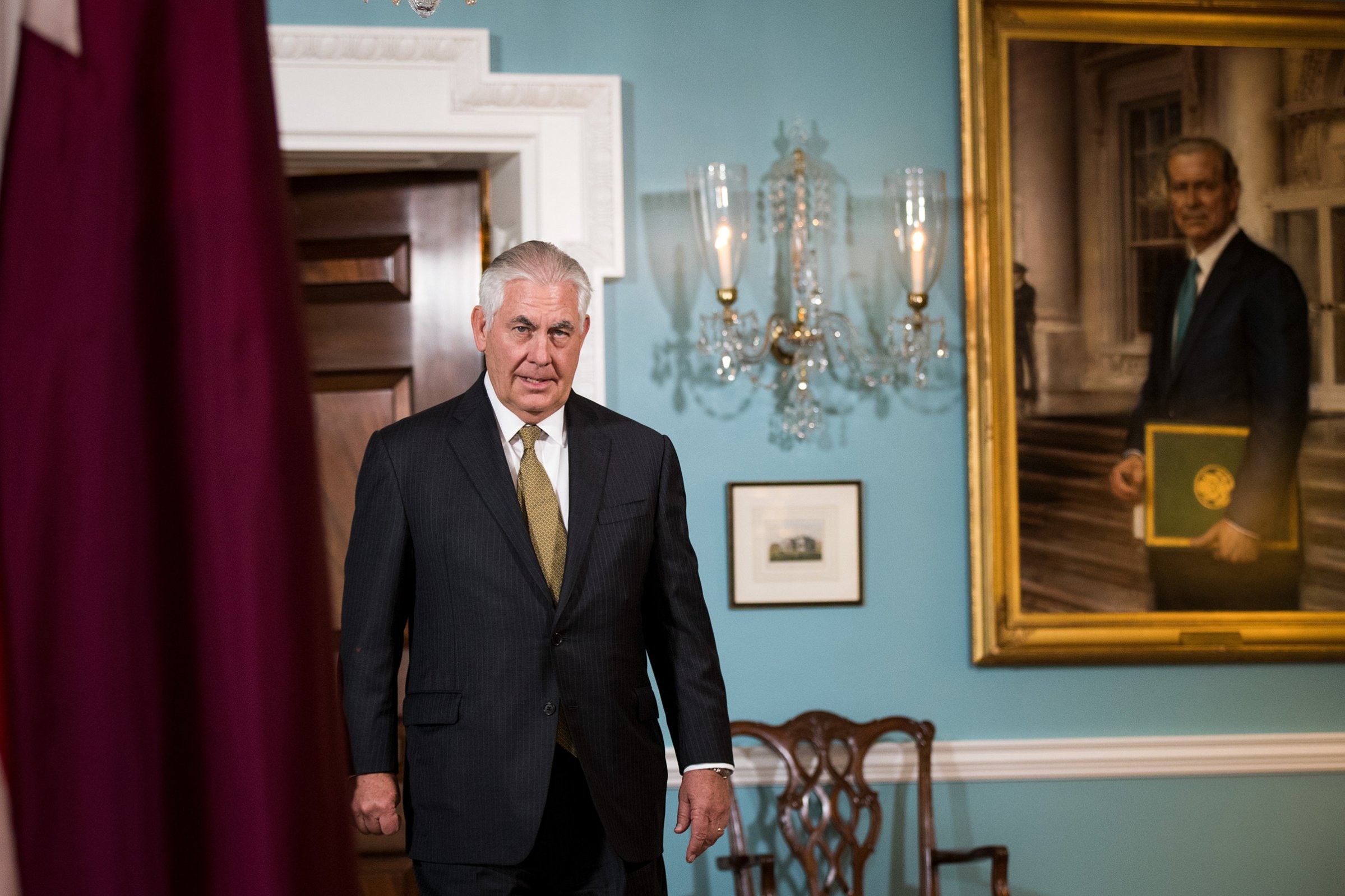 Secretary of State Rex Tillerson exits a brief media availability before his meeting with Qatari Foreign Minister Sheikh Mohammed Bin Abdulrahman Al Thani at the State Department, July 26, 2017 in Washington. When prompted by a reporter's question, Tillerson said 'I'm not going anywhere' and that he will stay on as Secretary of State 'as long as the president lets me.'