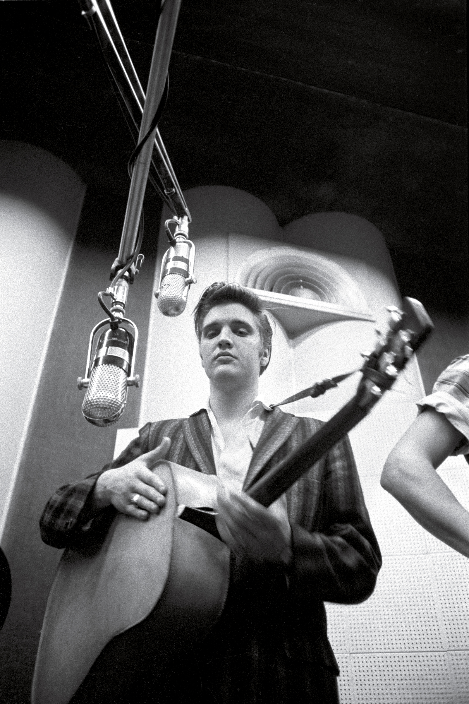 Elvis Presley recording at RCA Victor Studio in New York City in July 1956. (Alfred Wertheimer—Getty Images)