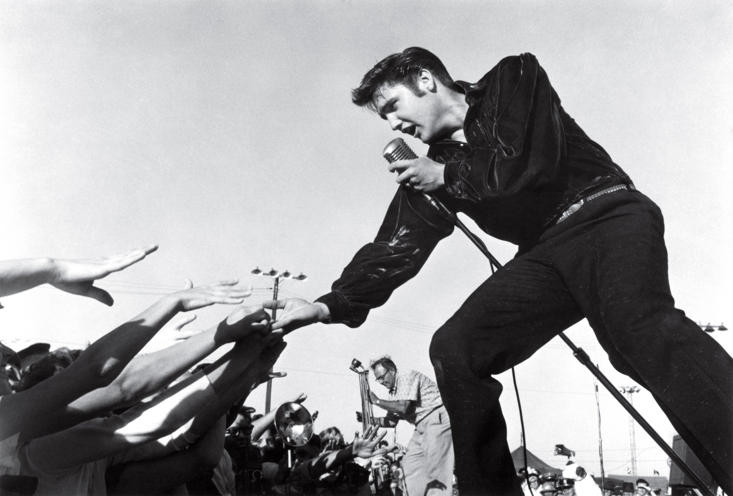 Elvis Presley performing at the Mississippi-Alabama Fair and Dairy Show in 1956 in Tupelo, Miss.