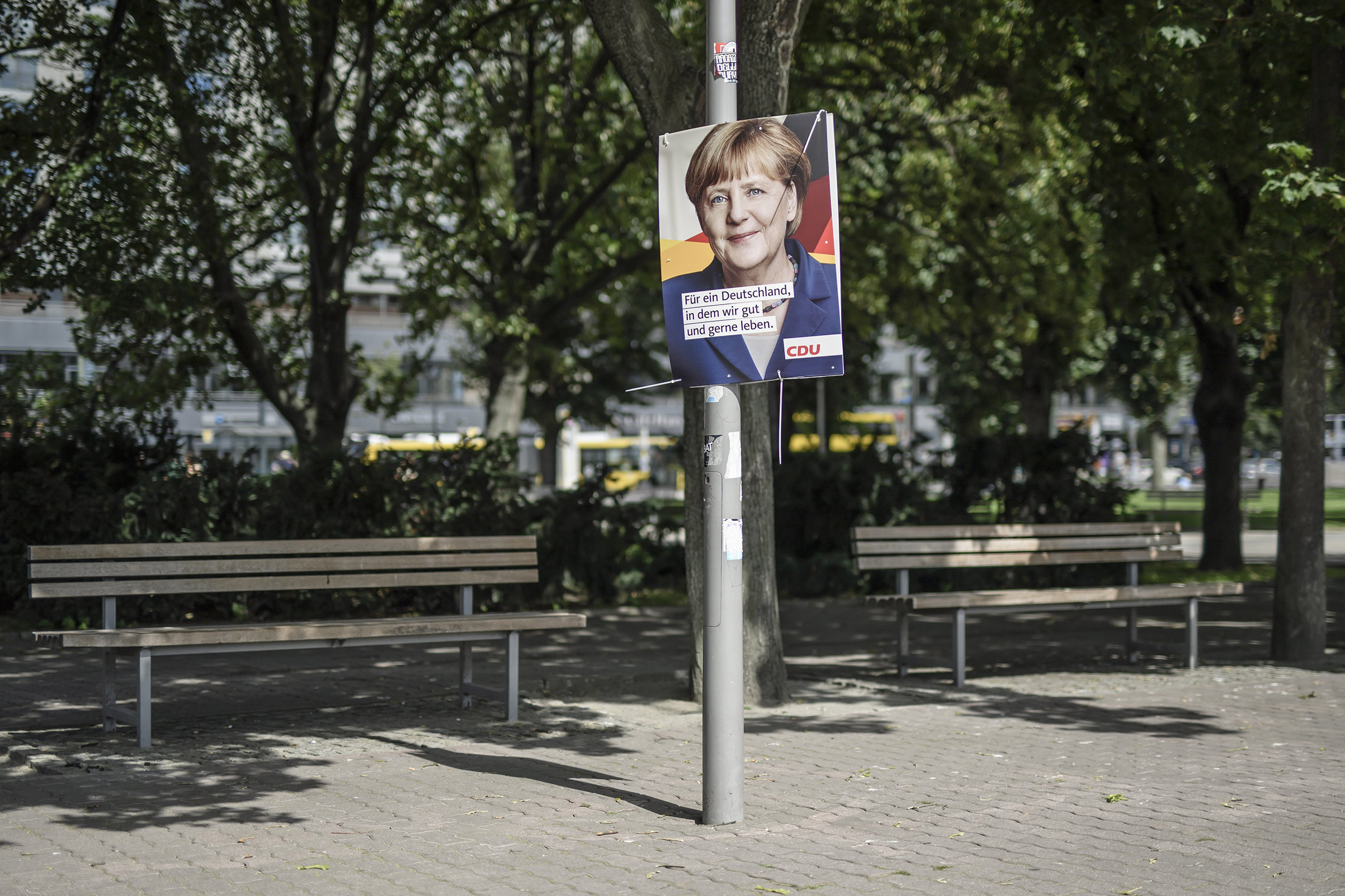 A campaign poster for Chancellor Angela Merkel in Berlin. The text reads, "For a Germany in which we live well and in which we like to live." (Clemens Bilan—EPA)