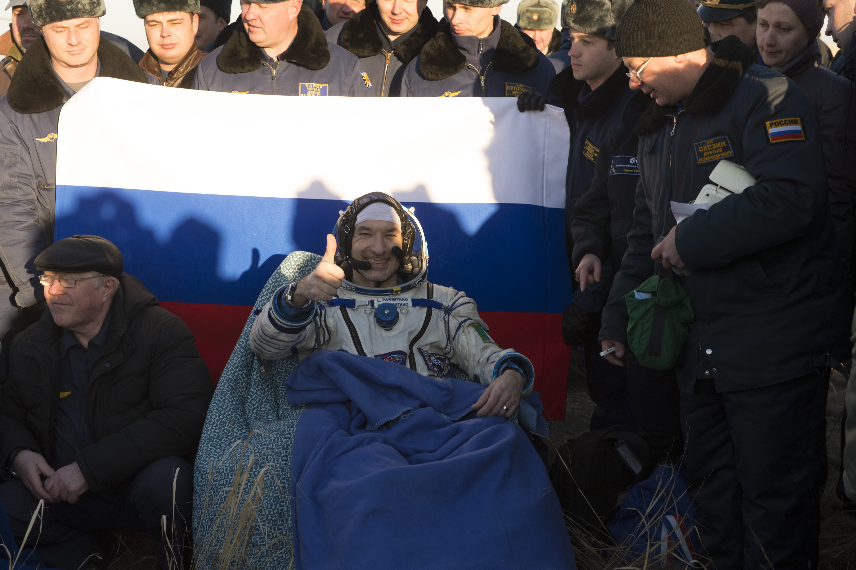 In this handout photo provided by the European Space Agency (ESA), ESA astronaut Luca Parmitano poses for photographs after returning to earth in the Soyuz TMA-09M spacecraft in the Kazakh Steppe region on Novemeber 11, 2013 in Kazakhstan. (Handout&mdash;2013 ESA)