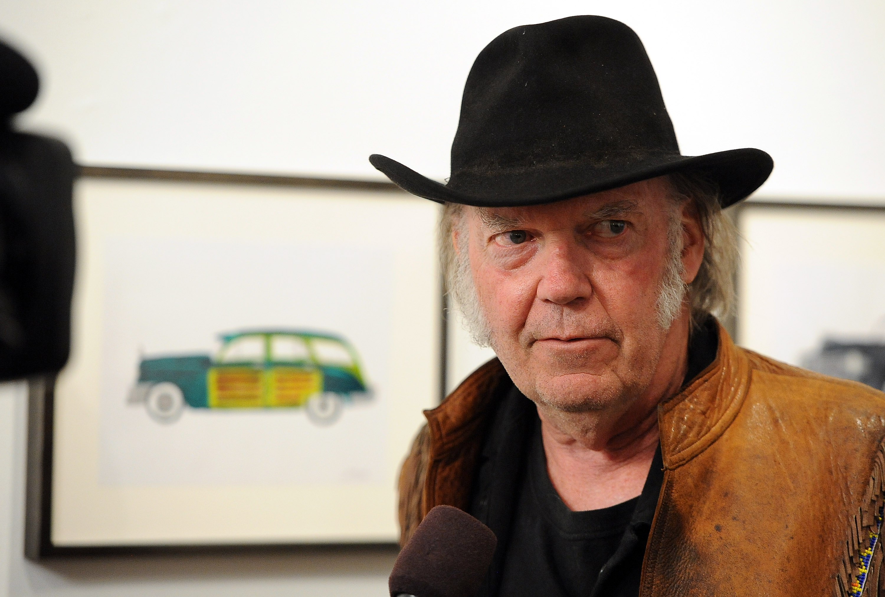 Neil Young at Robert Berman Gallery in Santa Monica, Calif. on Nov. 3, 2014. (Angela Weiss—Getty Images)