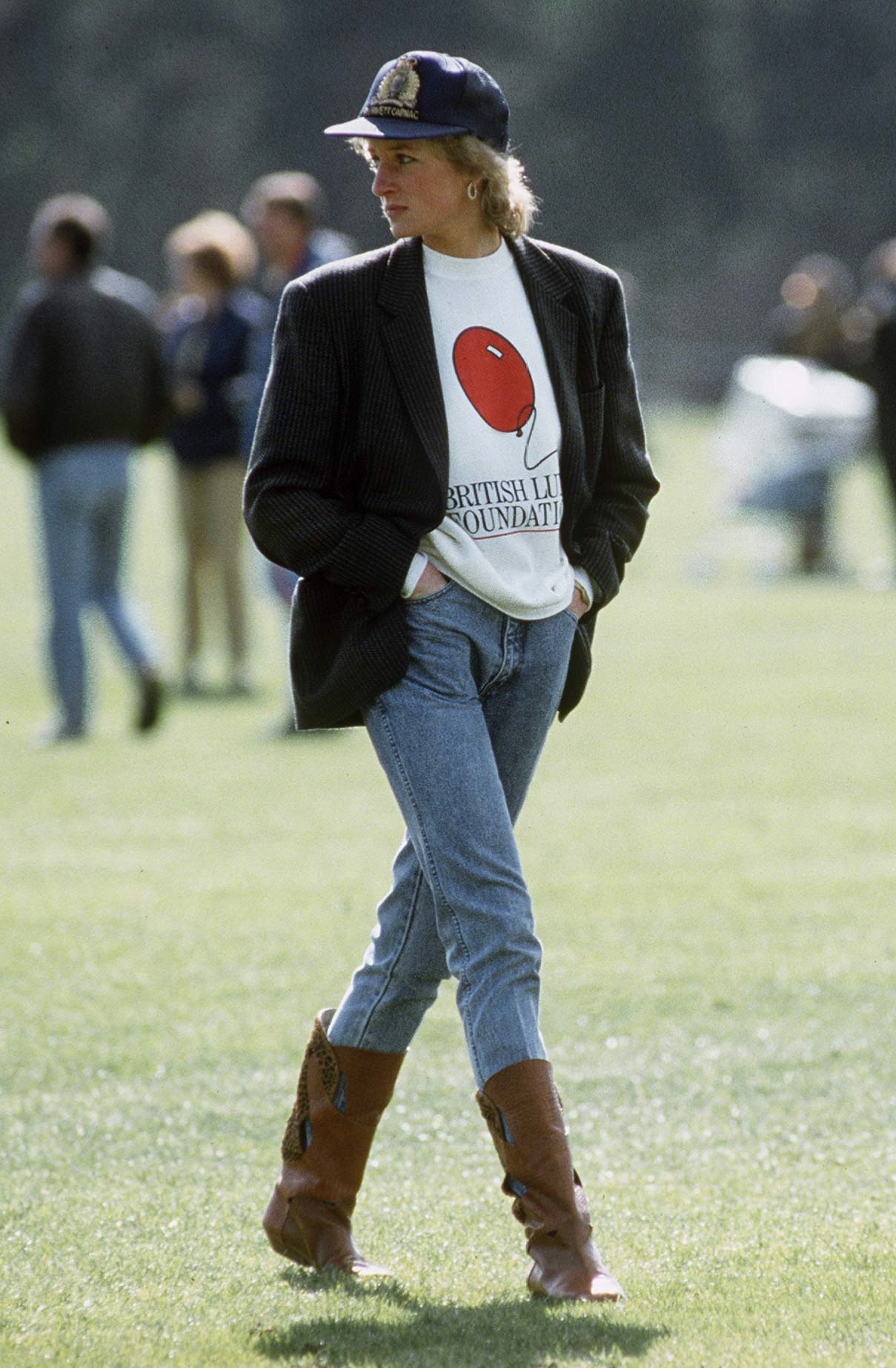 While at the Guards Polo Club in 1988, the princess proved that she could do off-duty style as well as formal wear when she paired jeans and a sweatshirt with an oversized blazer. A baseball cap was the perfect insouciant accessory.