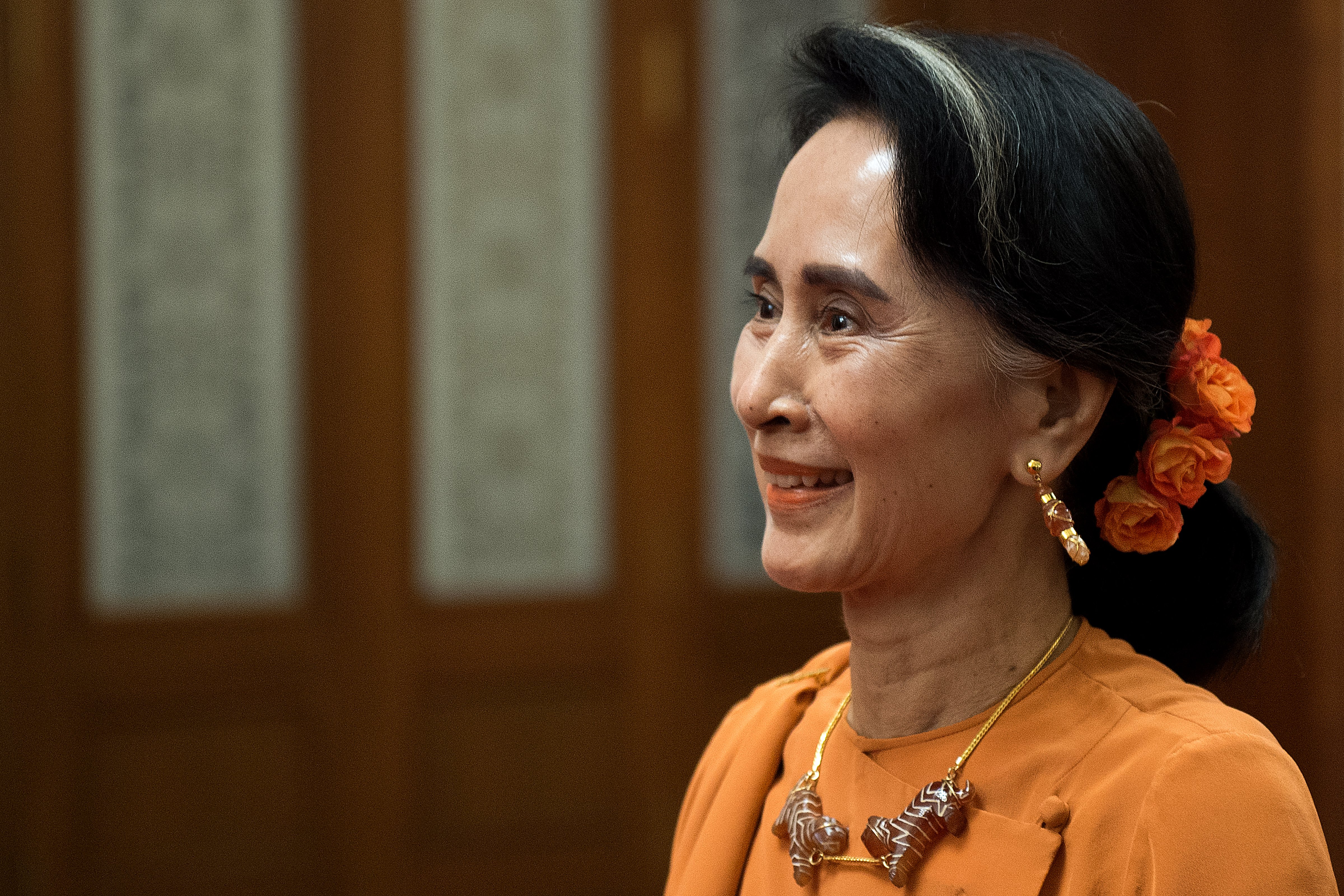 Myanmar State Counsellor Aung San Suu Kyi smiles at the Great Hall of the People on May 16, 2017 in Beijing, China. (Nicolas Asfouri—Getty Images)