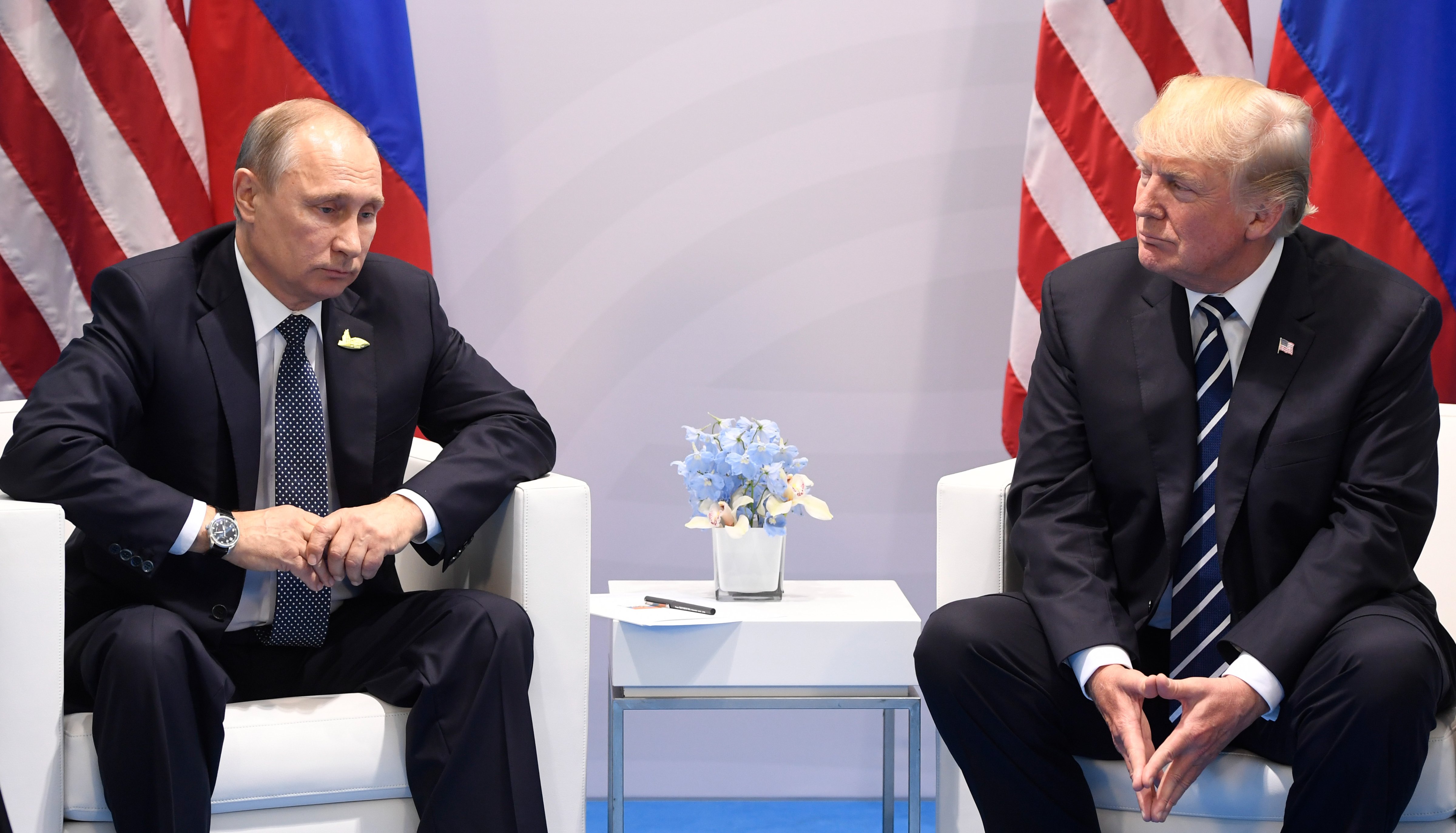 US President Donald Trump and Russia's President Vladimir Putin shake hands during a meeting on the sidelines of the G20 Summit in Hamburg, Germany, on July 7, 2017. (Saul Loeb&mdash;AFP/Getty Images)