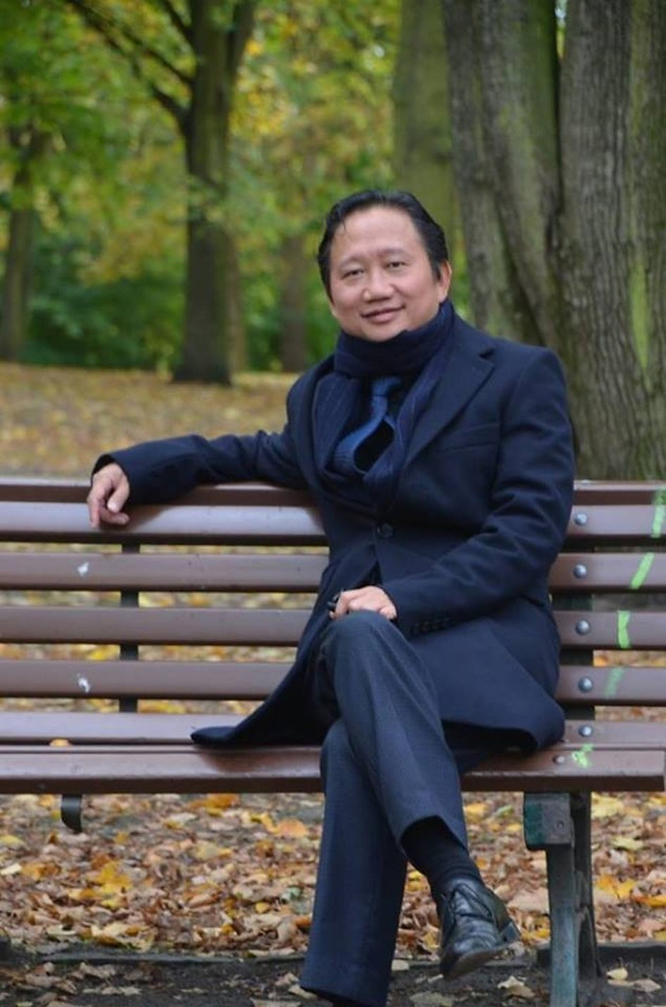 This undated picture received on August 2, 2017 shows Vietnamese national Trinh Xuan Thanh sitting on a park bench in Berlin. (STR—AFP/Getty Images)