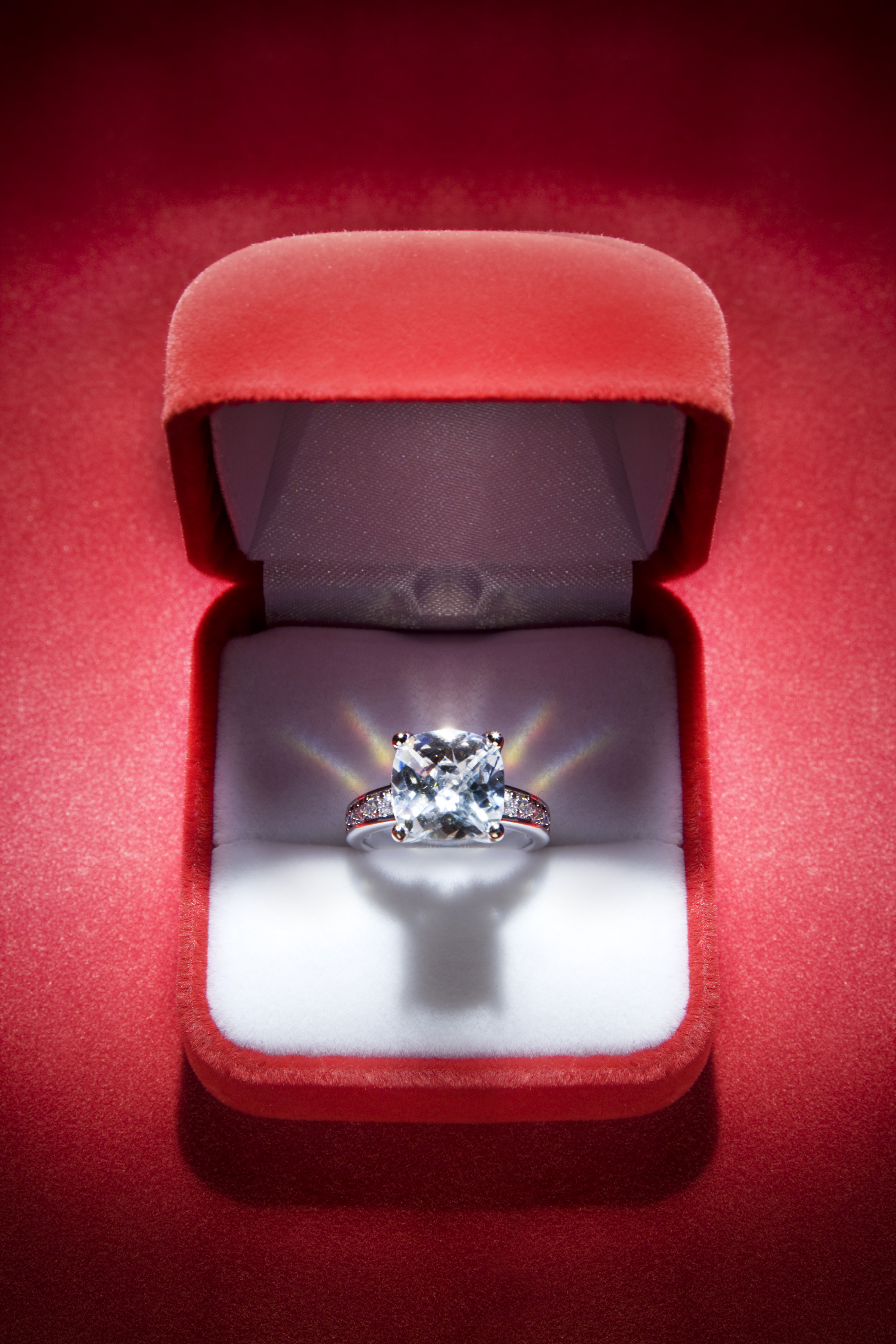 Diamond ring in red velvet box (Tooga&mdash;Getty Images)