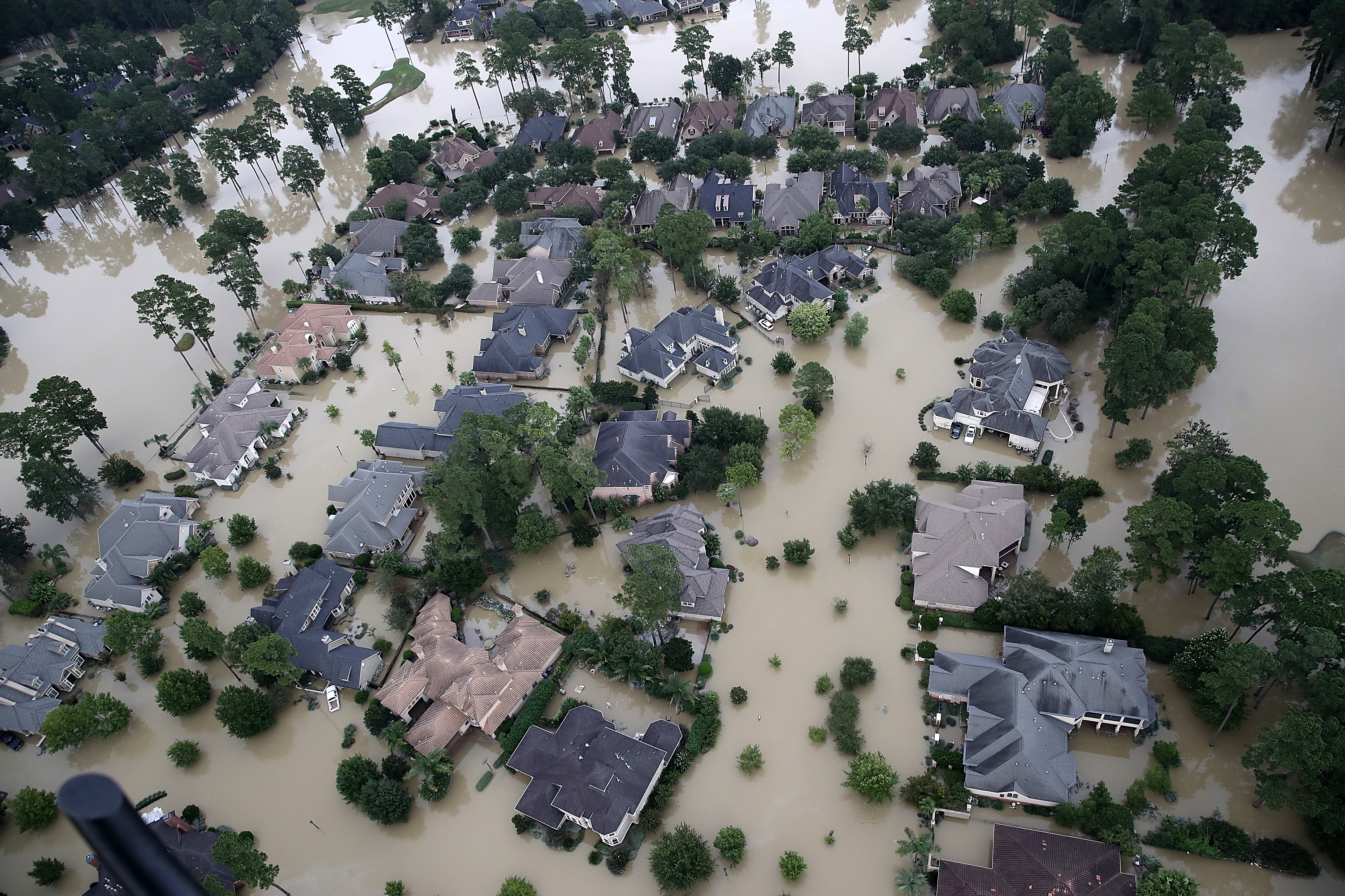 Flooded homes are shown near Lake Houston following Hurricane Harvey August 30, 2017 in Houston, Texas. The city of Houston is still experiencing severe flooding in some areas due to the accumulation of historic levels of rainfall, though the storm has moved to the north and east. (Win McNamee&mdash;Getty Images)