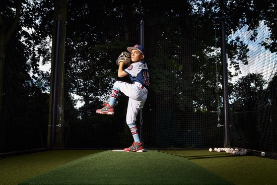 “I love working hard,” says Joey Erace, 10, who lives in southern New Jersey but has suited up for baseball teams based in California and Texas. His Instagram account  @joeybaseball12 has more than 24,000 followers. Here Joey is photographed at home in Mullica Hill, New Jersey where his father set up a batting cage in their yard where he practices with a hitting coach, on Aug. 8, 2017.
