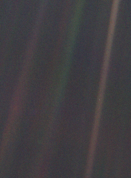 This narrow-angle color image of the Earth, dubbed 'Pale Blue Dot', is a part of the first ever 'portrait' of the solar system taken by Voyager 1. (NASA/JPL)