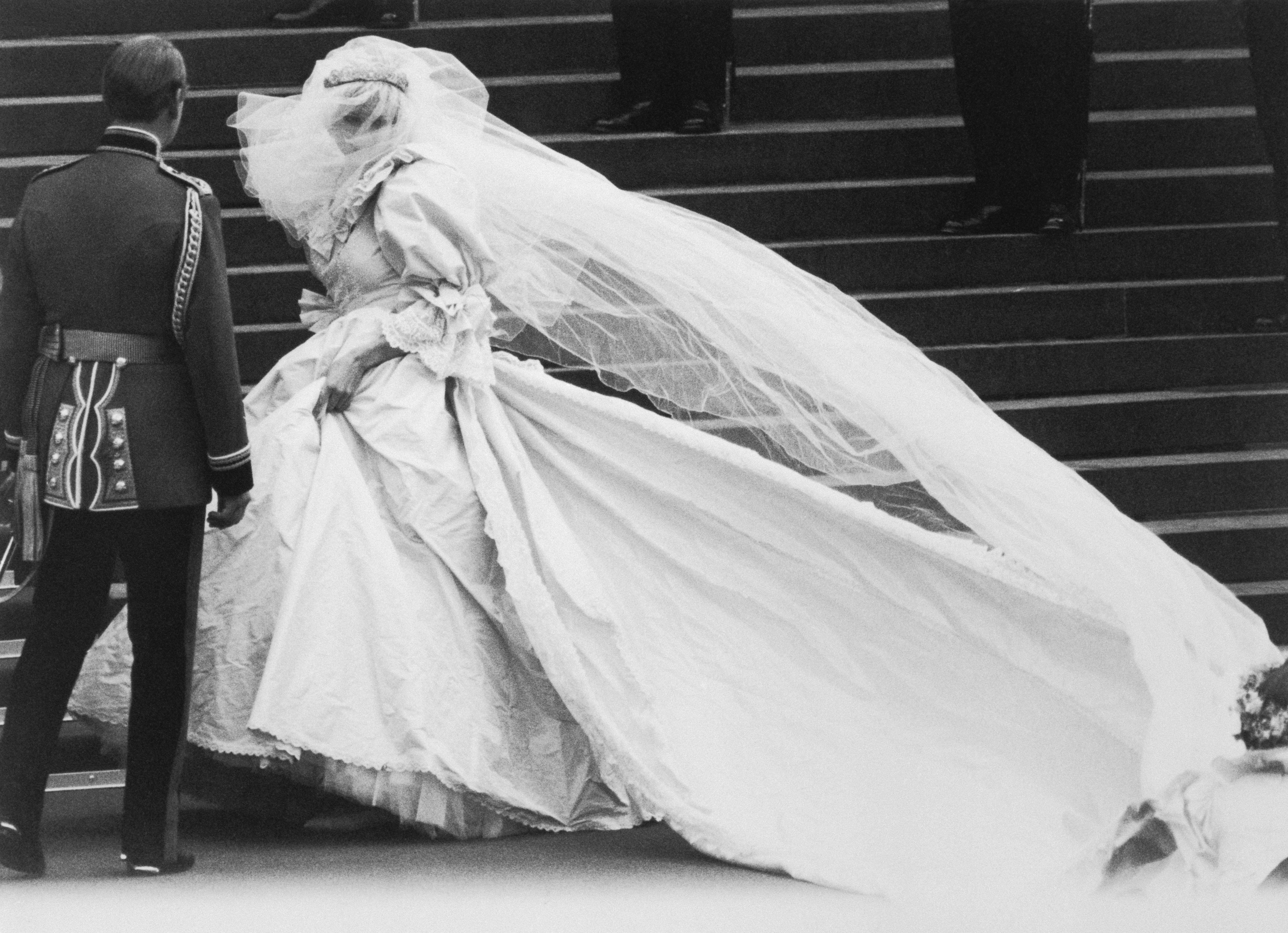 Lady Diana Spencer arrives at St. Paul's Cathedral on her wedding day, revealing to the world the wedding dress which had been carefully guarded during its design. (Bettmann—Bettmann Archive)
