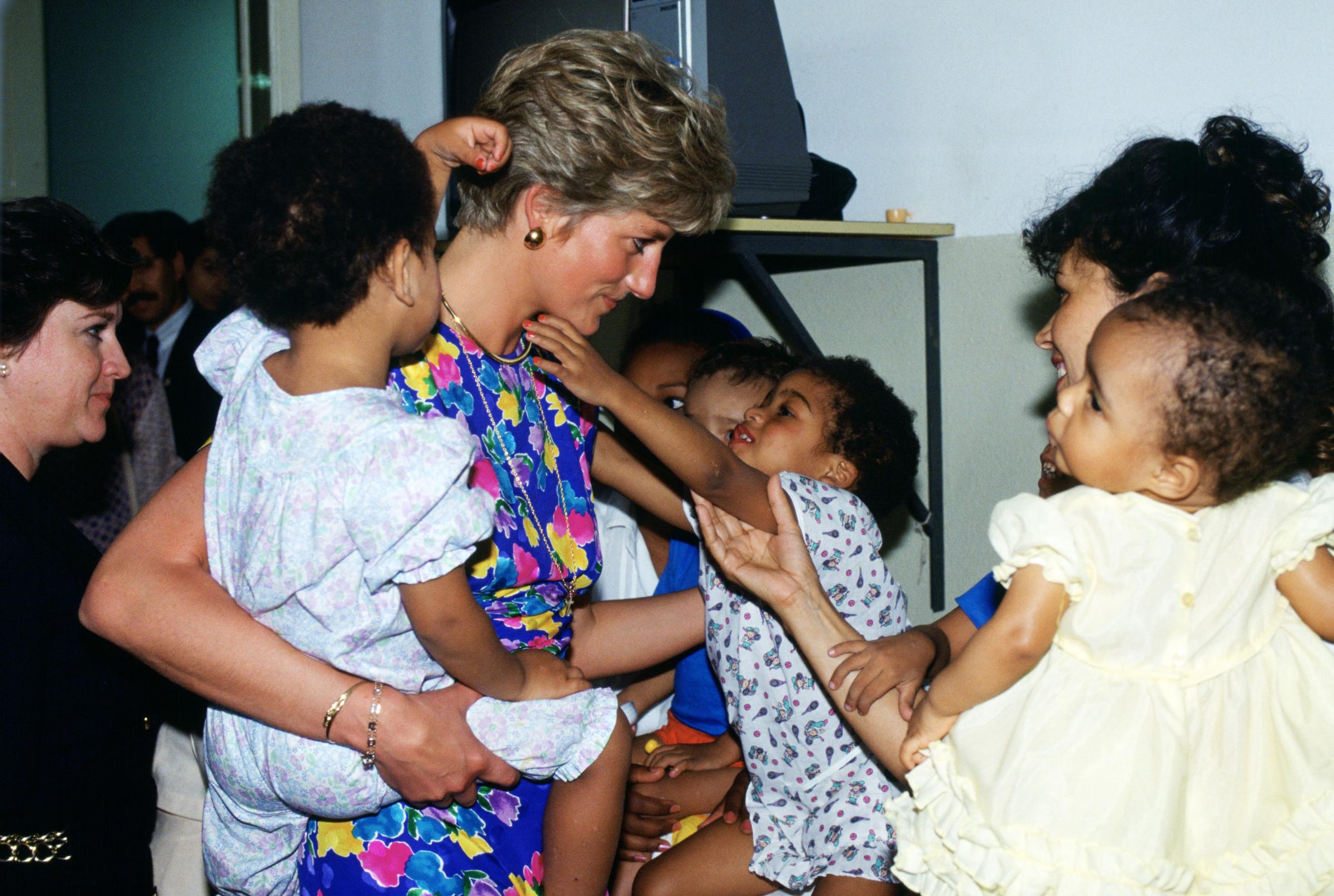 Diana, Princess of Wales visits a hostel for abandoned child