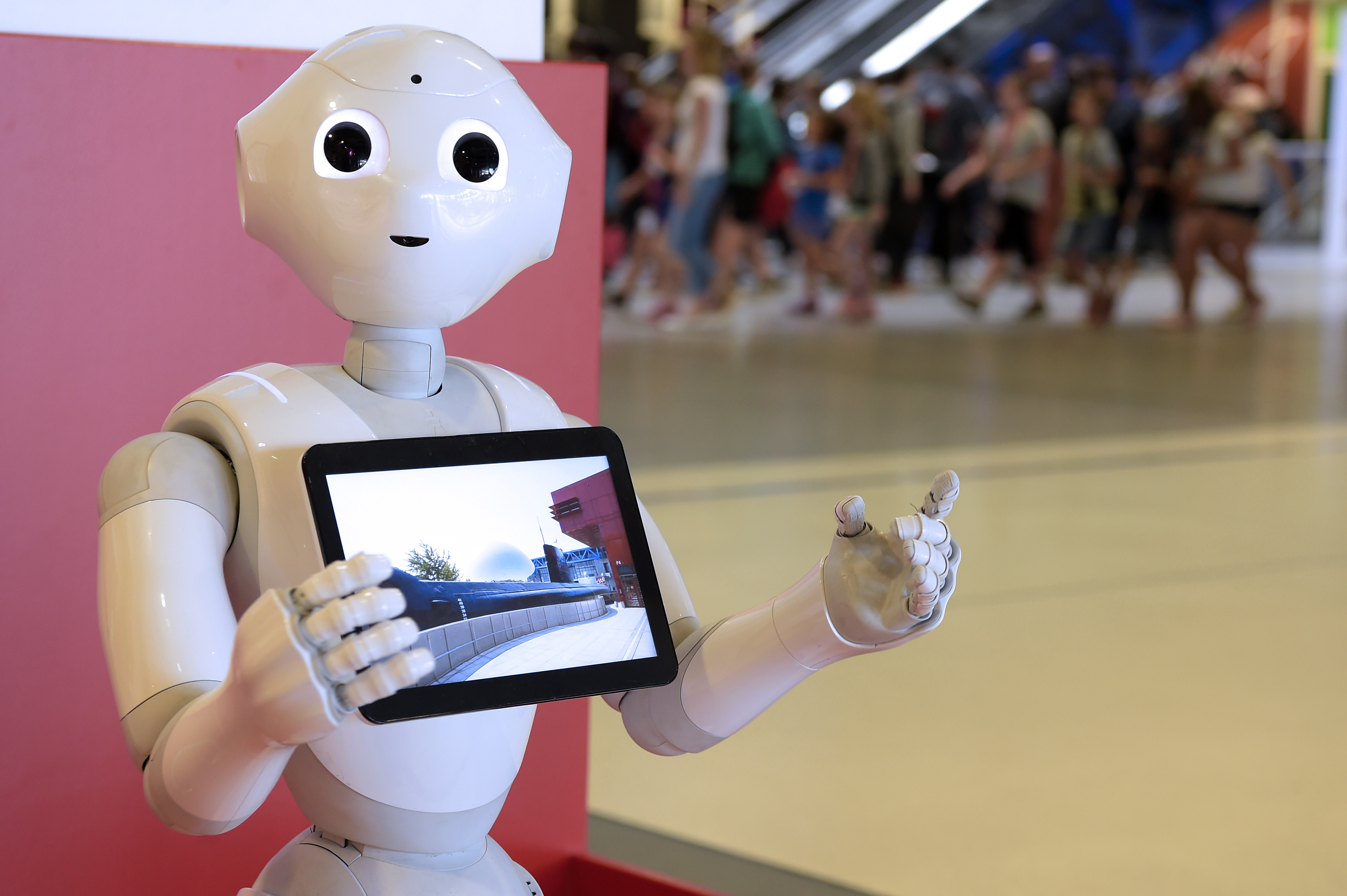 Pepper the robot gives informations at the Cite des Sciences et de l'Industrie museum in Paris on June 13, 2017. (BERTRAND GUAY&mdash;AFP/Getty Images)