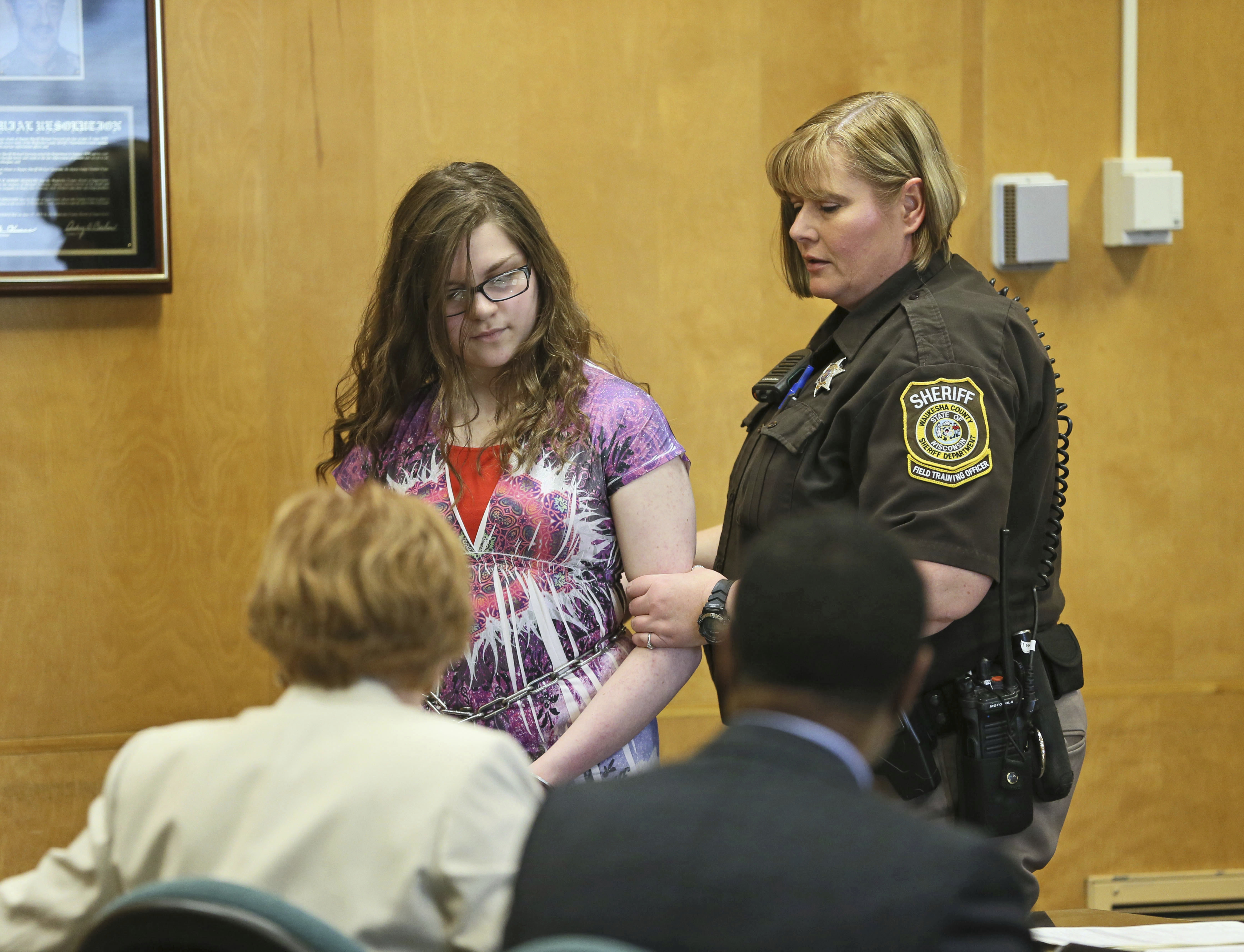 In a Monday, Feb. 20, 2017 file photo, Anissa Weier, 15, appears in court in Waukesha, Wis. Weier, one of two Wisconsin girls charged with repeatedly stabbing a classmate to impress the fictitious horror character Slender Man, pleaded guilty Aug. 21, 2017, to attempted second-degree homicide as a party to a crime, with use of a deadly weapon. (Michael Sears—Milwaukee Journal-Sentinel/AP)