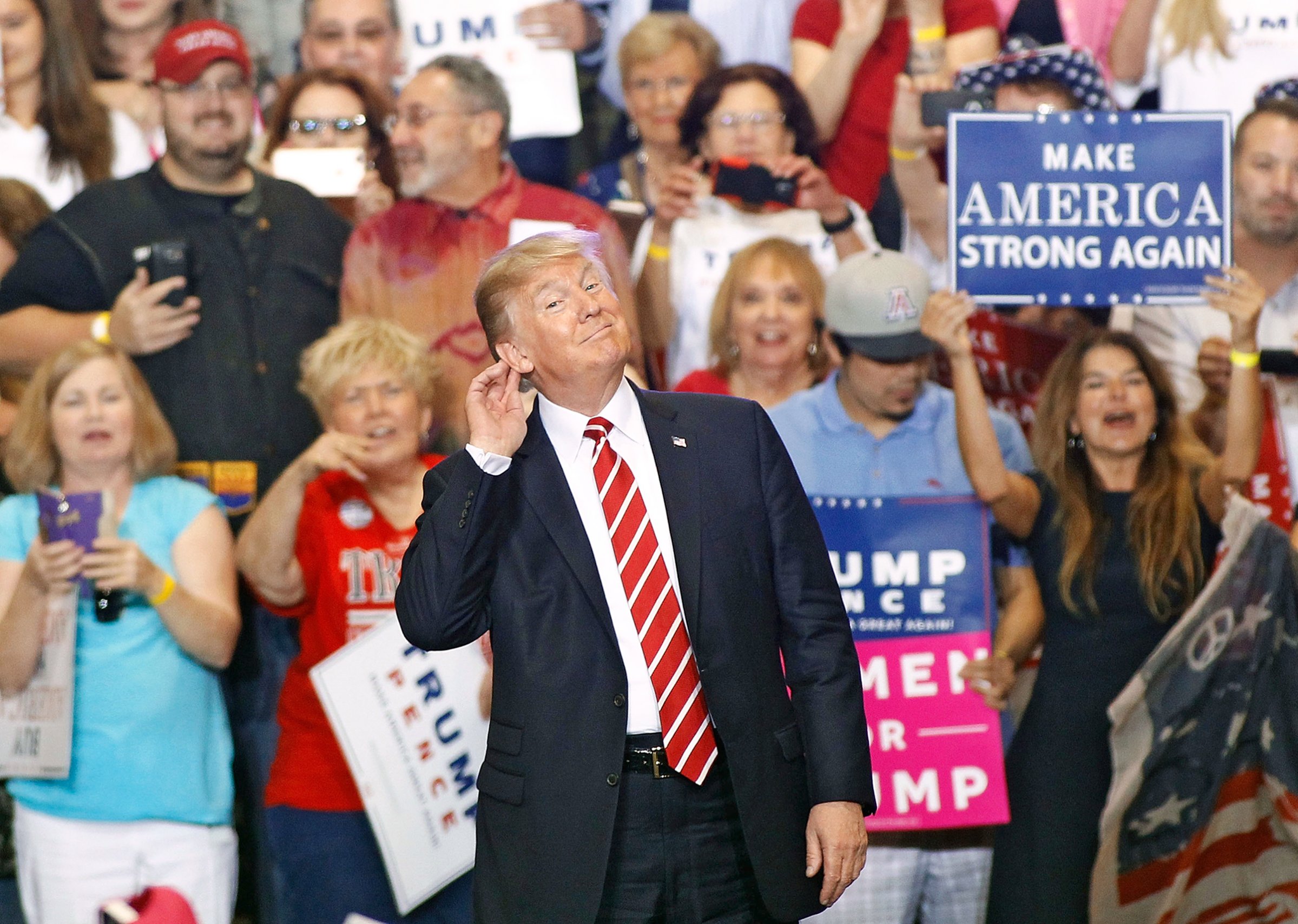 The President attacked the press and fellow Republicans at a raucous Aug. 22 event in Phoenix