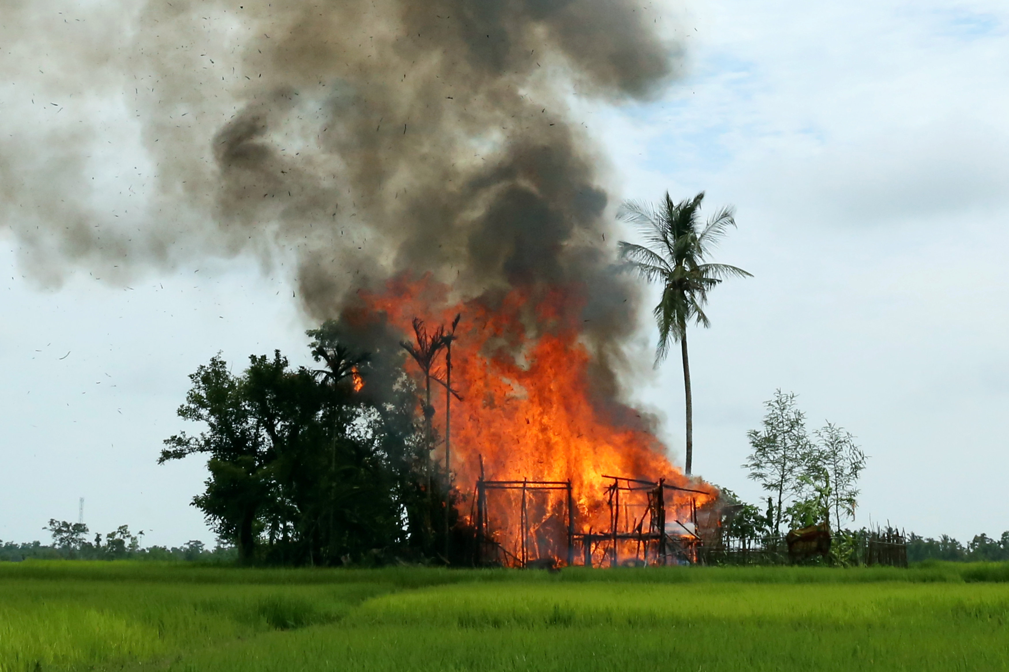 A house on fire in Gawduthar village, Maungdaw township, in the north of Rakhine state, Myanmar September 7, 2017. (Stringer—Reuters)