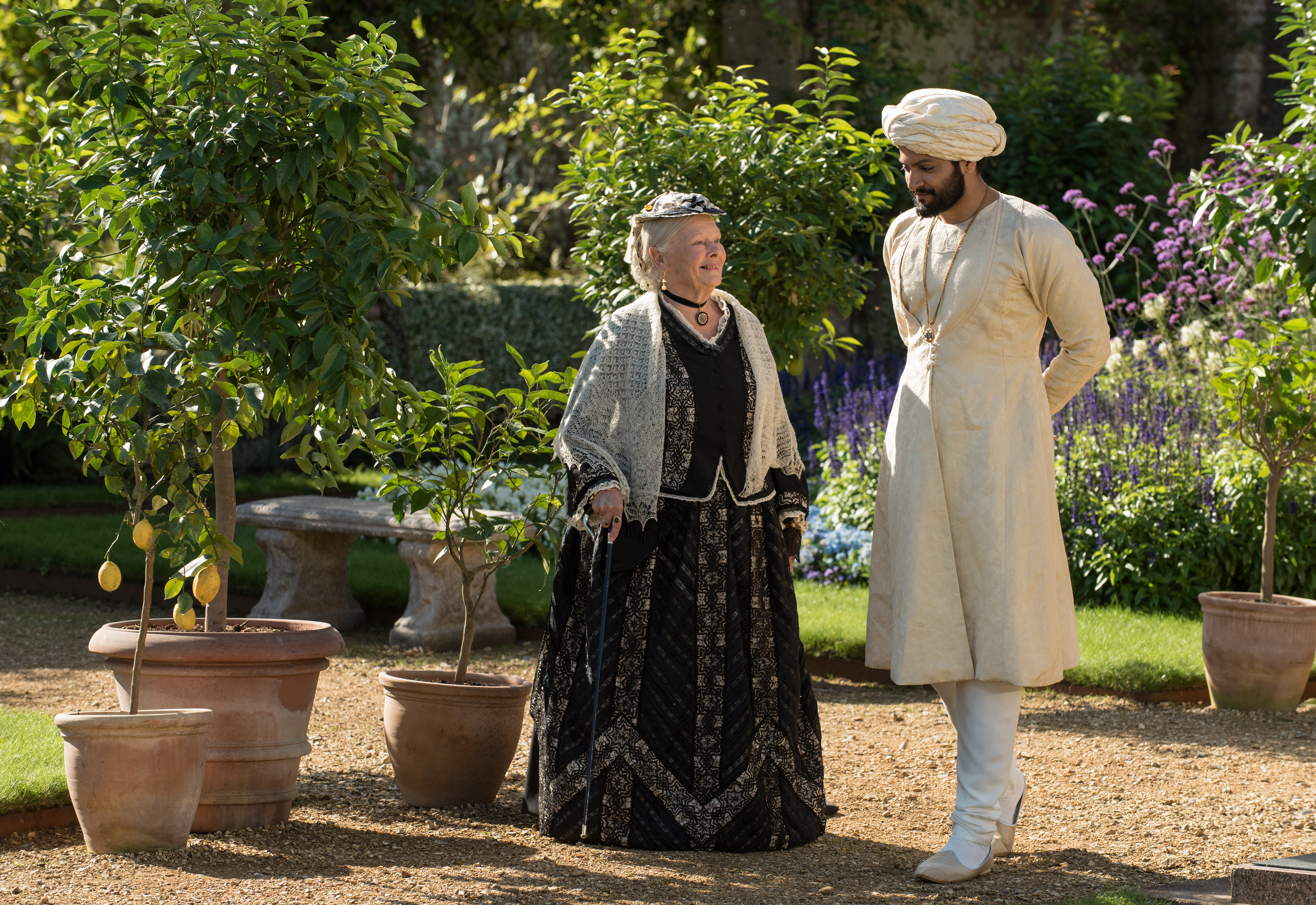 Judi Dench as Queen Victoria and Ali Fazal as Abdul Karim. (Peter Mountain—Focus Features)