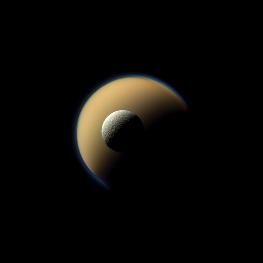 Here Cassini captures Saturn's largest and second largest moons, Titan and Rhea, from over 1 million kilometers away in a true-color image on June 16, 2011. (NASA / JPL / Space Science Institute.)