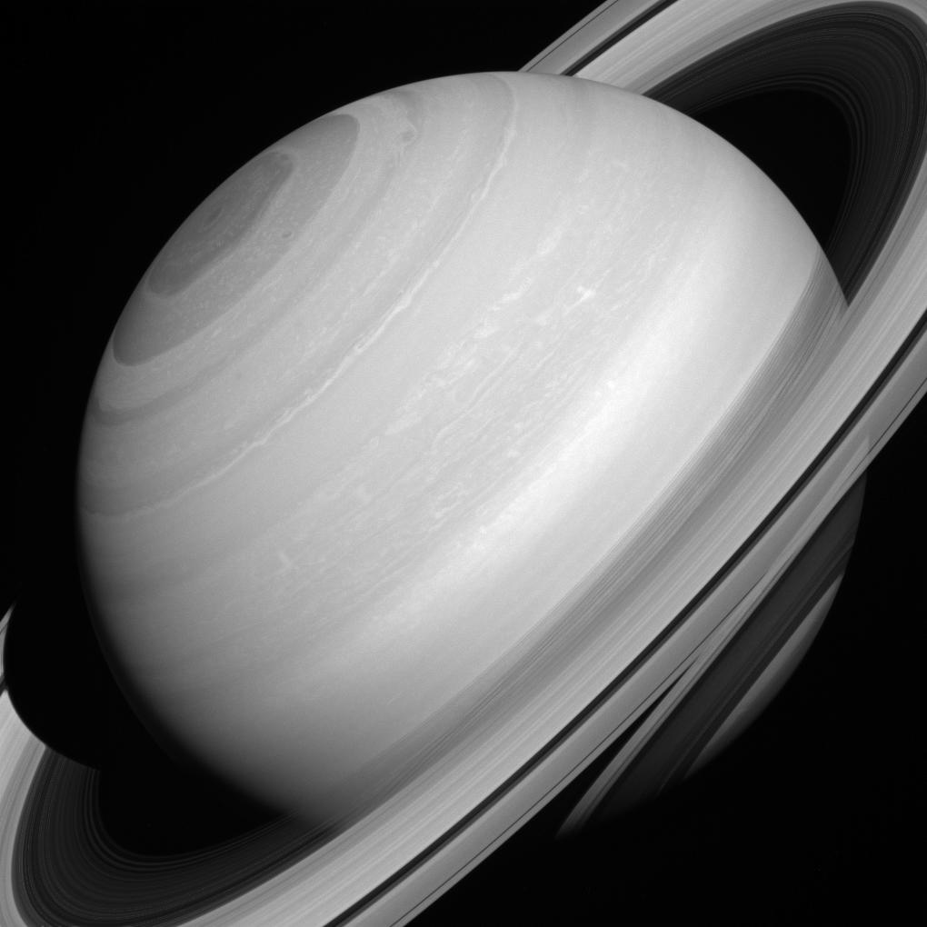 Although solid-looking in many images, Saturn's rings are actually translucent. In this picture, taken August 12, 2014 we can glimpse the shadow of the rings on the planet through (and below) the A and C rings themselves. (NASA / JPL / Space Science Institute.)