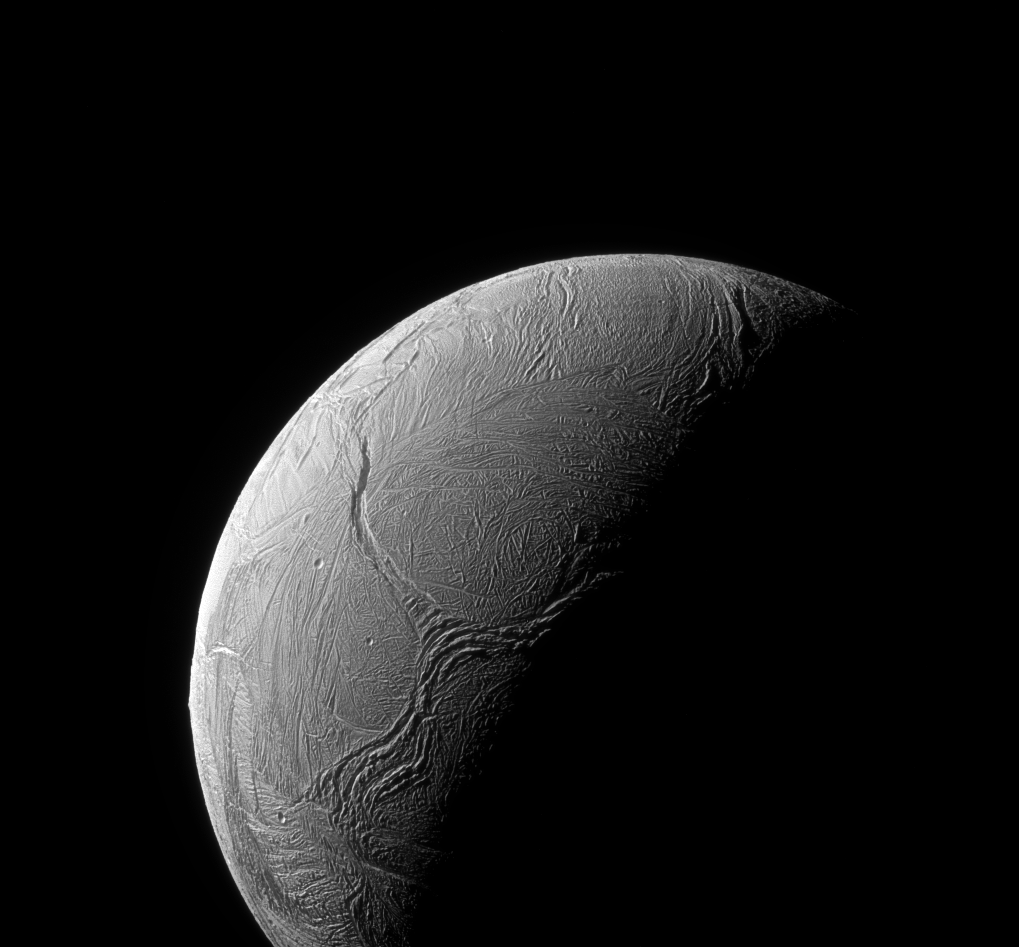 A sinuous feature snakes northward from the north pole of Saturn's sixth biggest moon, Enceladus, like a giant tentacle on Feb. 15, 2016. (NASA / JPL / Space Science Institute.)