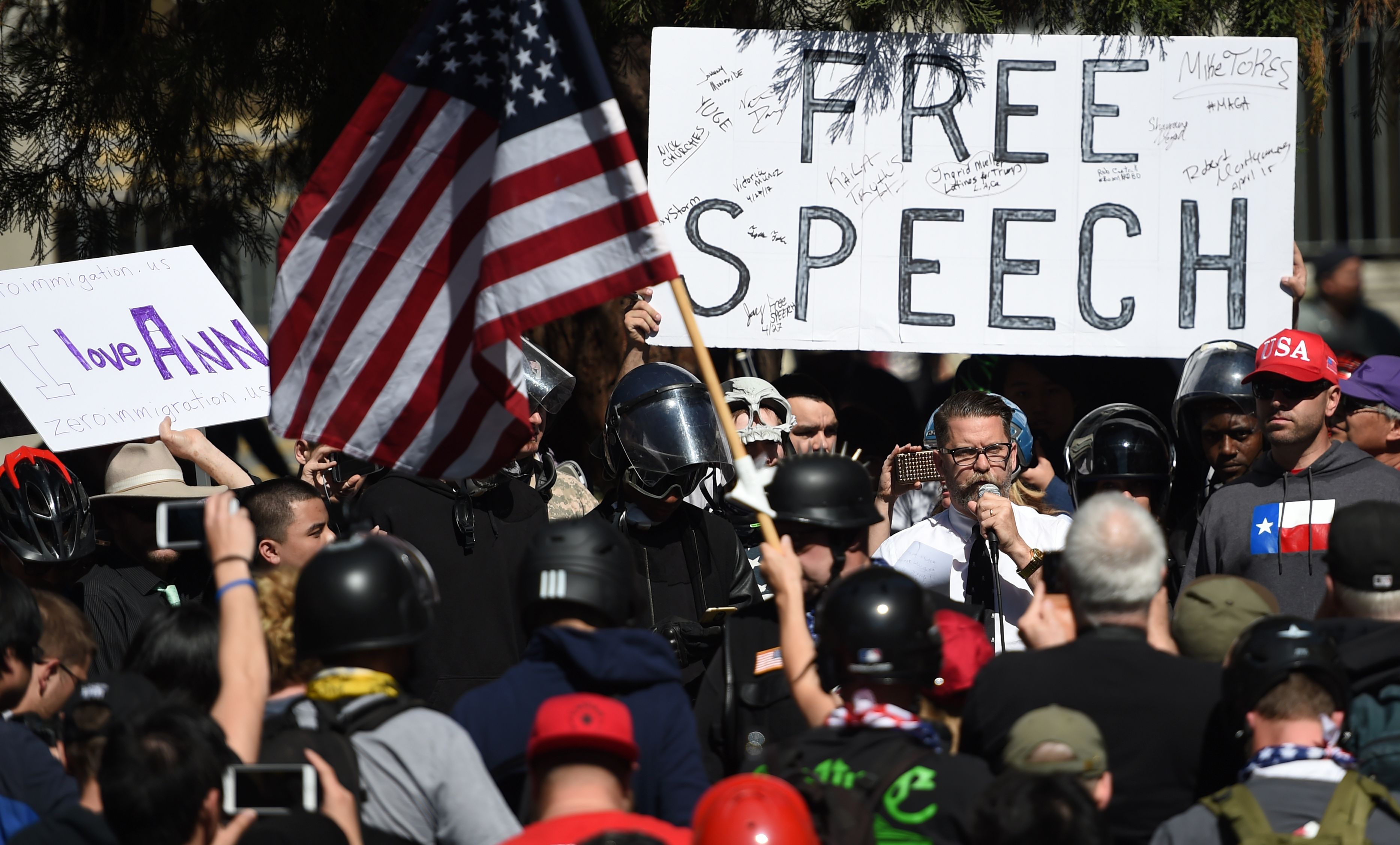 Vice Media co-founder and conservative speaker Gavin McInnes reads a speech written by Ann Coulter to a crowd during a rally in Berkeley, California on April 27, 2017. (Josh Edelson—AFP/Getty Images)