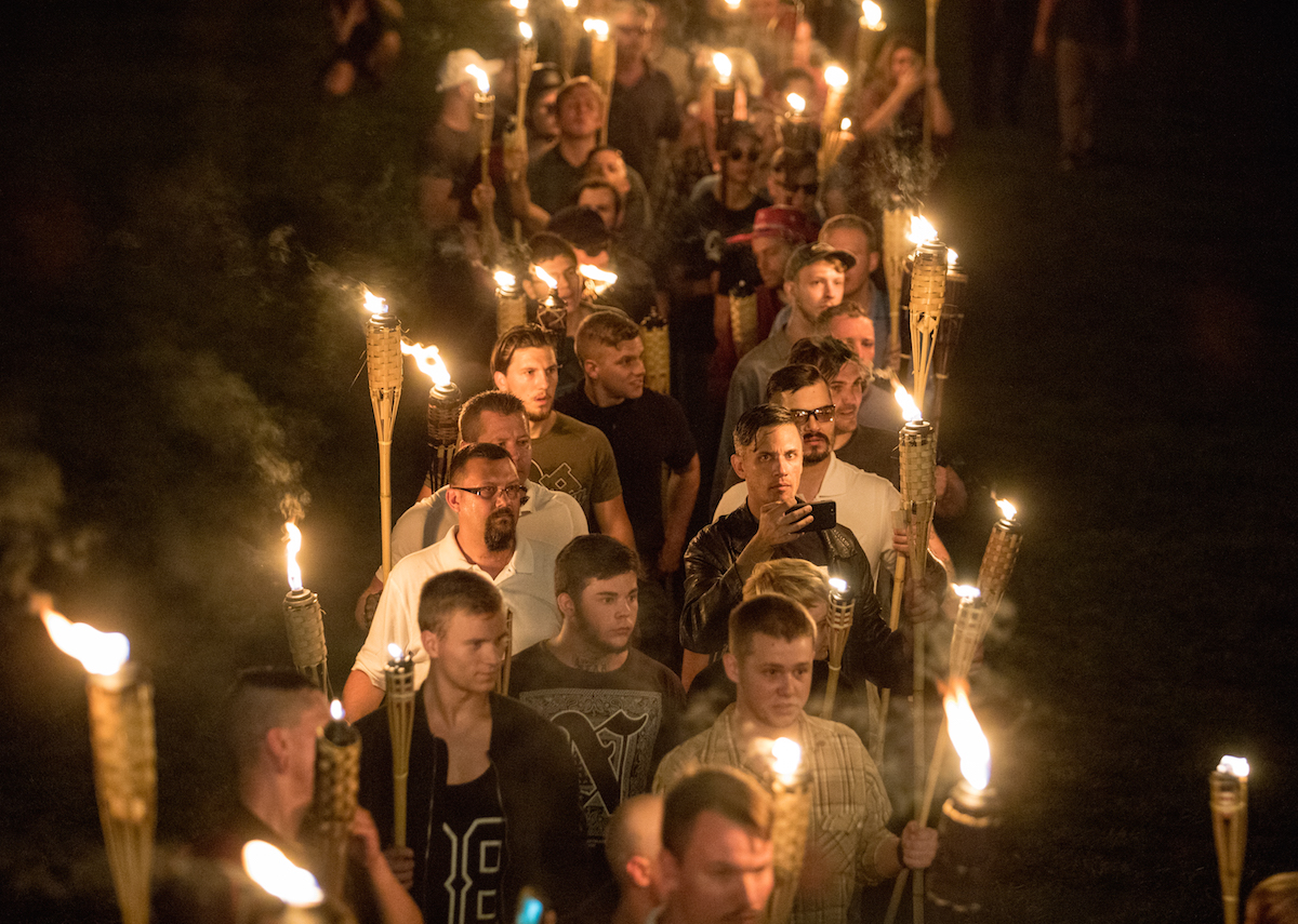 White nationalists and white supremacists carrying torches marched in a parade through the University of Virginia campus in Charlottesville, Va., on Aug. 11, 2017. (Evelyn Hockstein—The Washington Post / Getty Images)