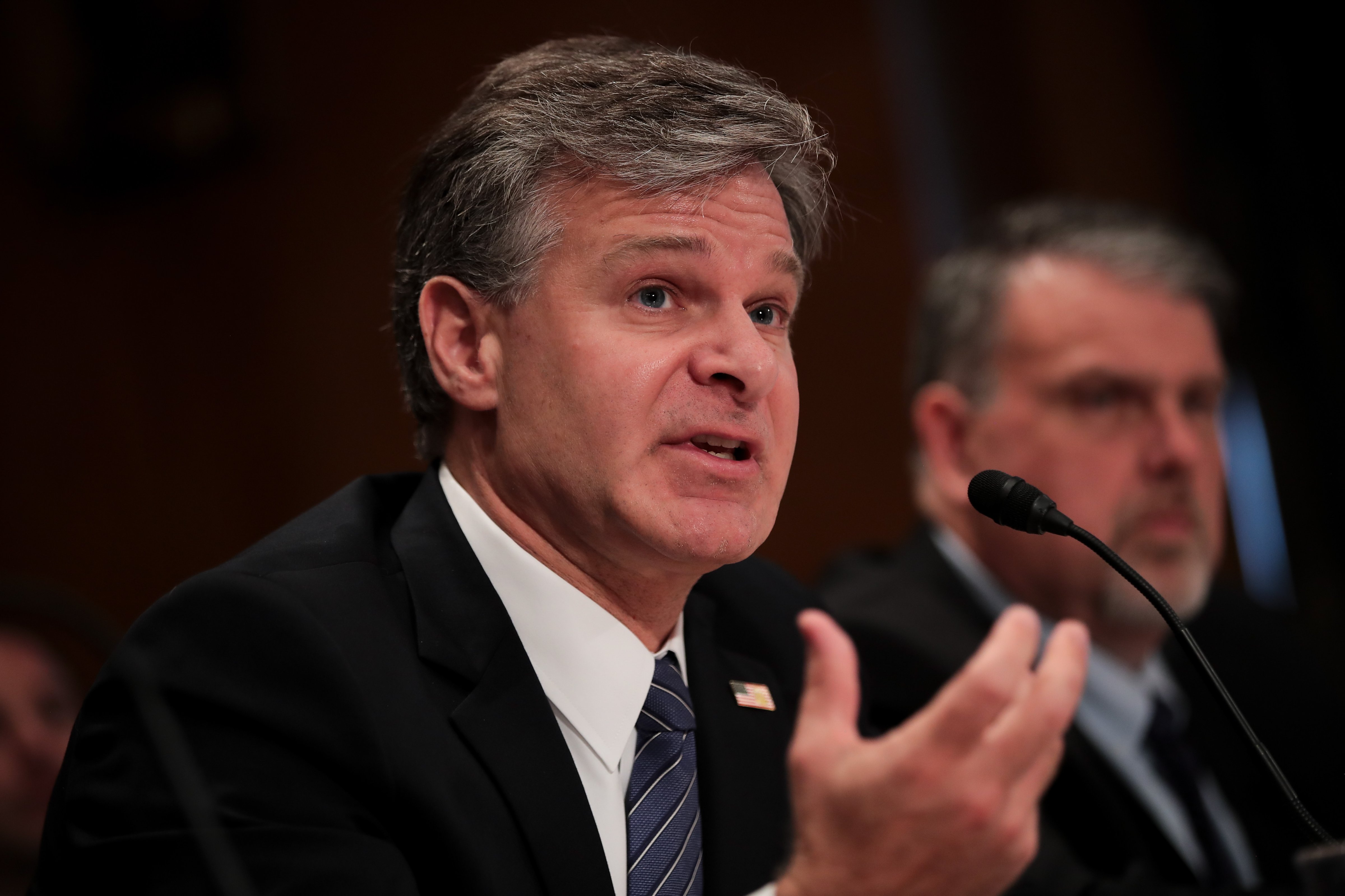 Director of the Federal Bureau of Investigation Christopher Wray listens testifies during a Senate Committee on Homeland Security and Governmental Affairs hearing concerning threats to the homeland, September 27, 2017 in Washington, DC. (Drew Angerer—Getty Images)