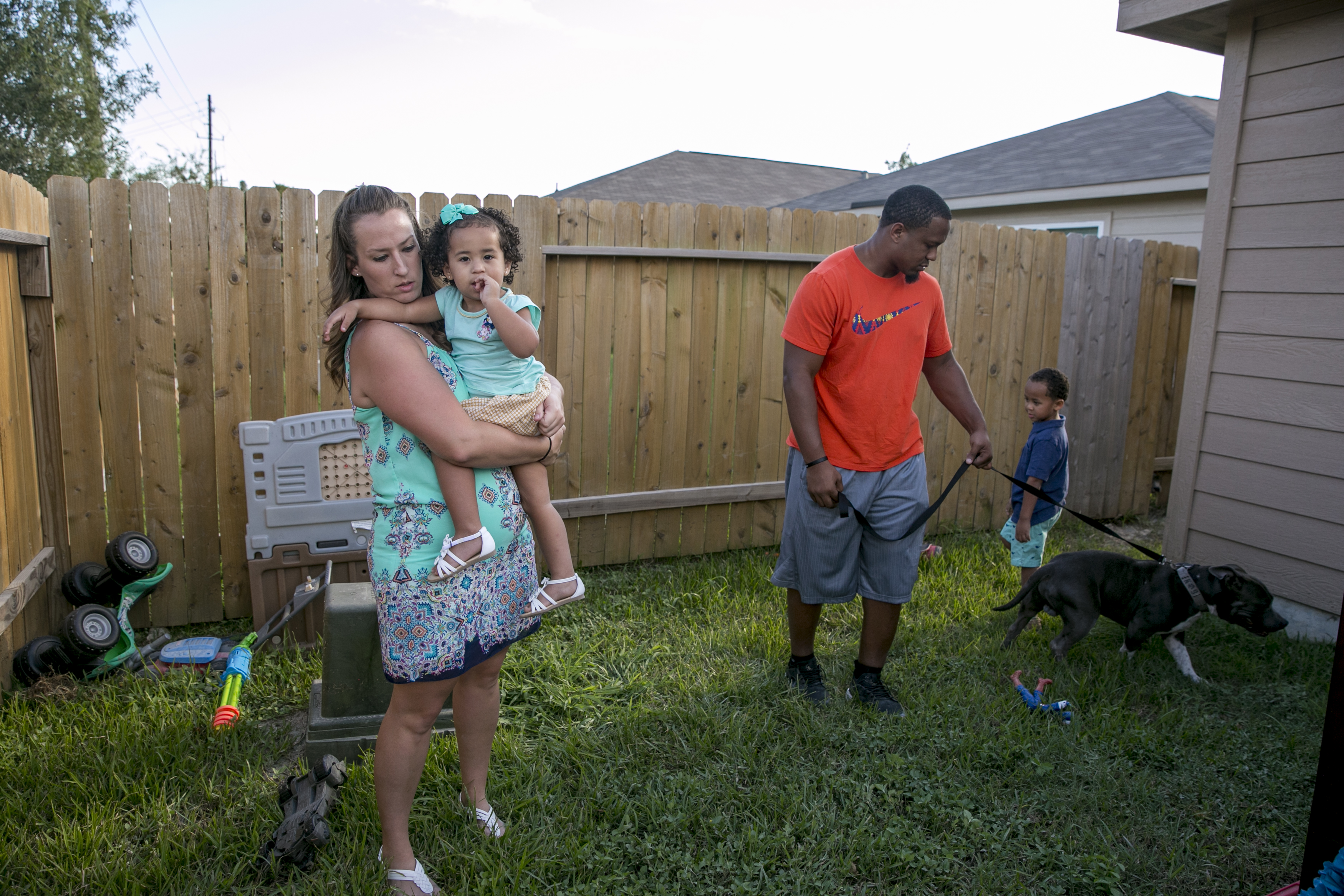 The Courtney family in the backyard of their home. (Ilana Panich-Linsman for TIME)