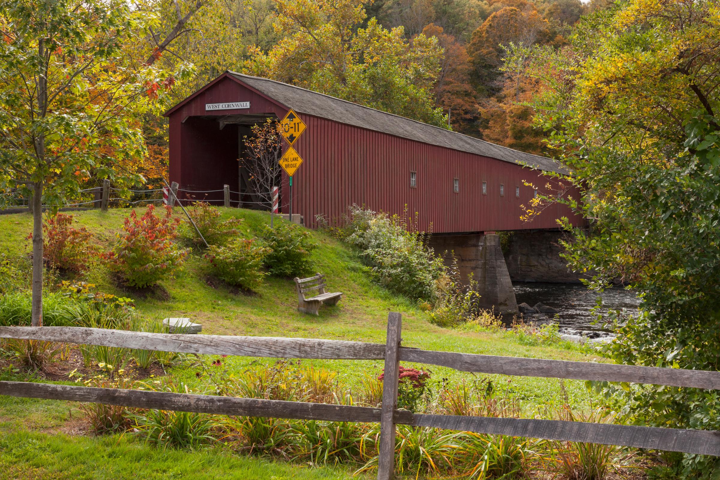 Covered bridge and autumn tree colors