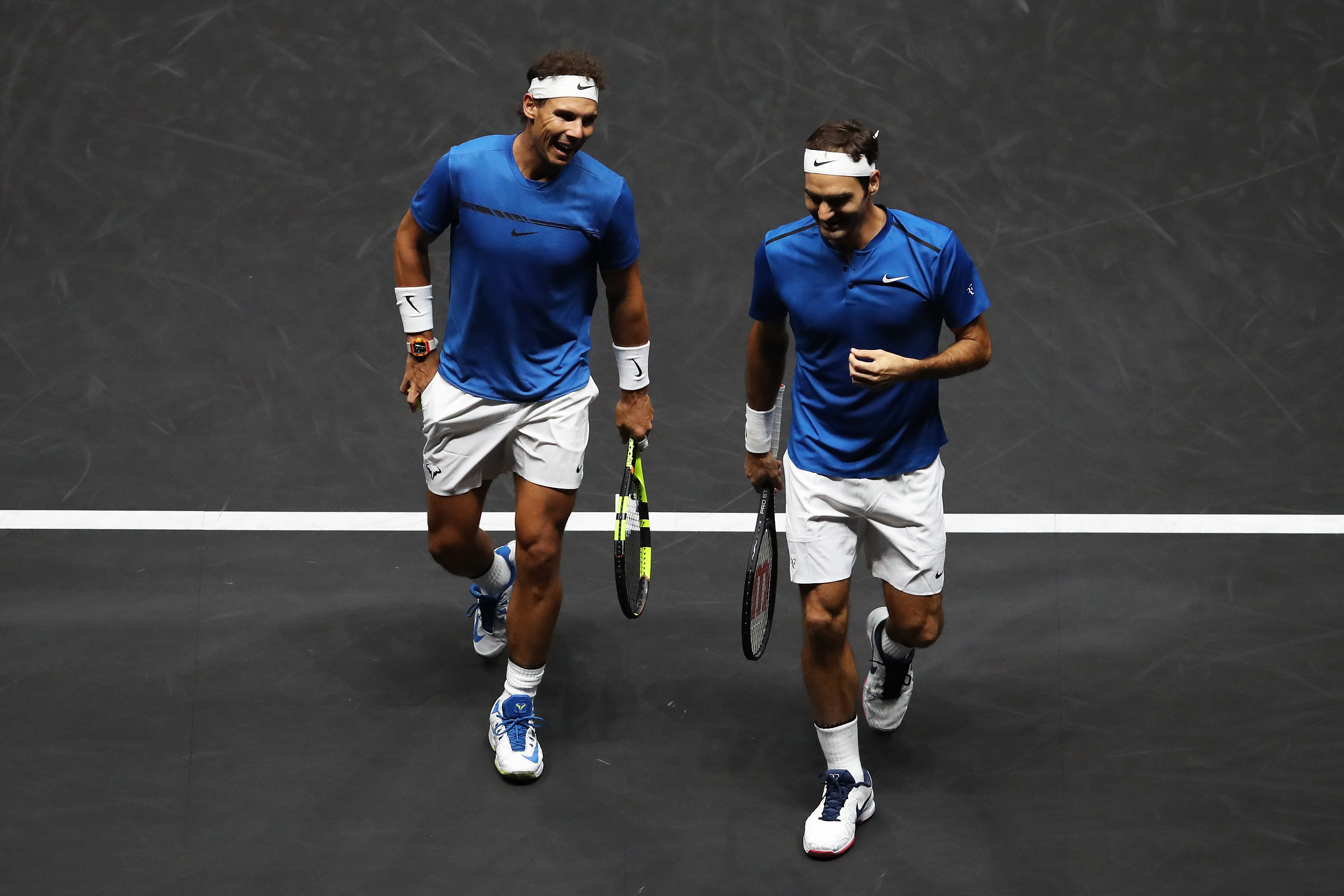 Roger Federer and Rafael Nadal of Team Europe react during there doubles match against Jack Sock and Sam Querrey of Team World on Day 2 of the Laver Cup on September 23, 2017 in Prague, Czech Republic. (Julian Finney&mdash;Getty Images for Laver Cup)