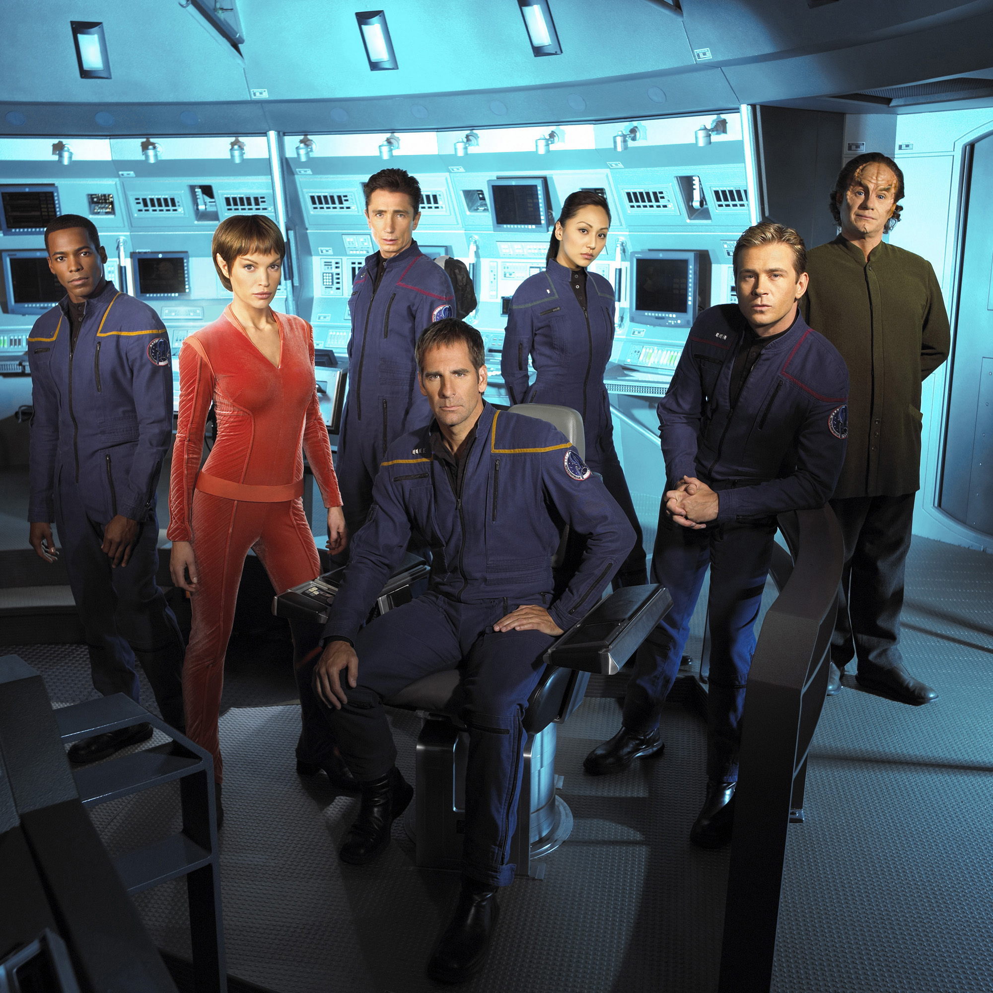 Promotional portrait of the cast of the UPN television series, 'Star Trek: Enterprise,' in costume and on set, 2003. L-R: Anthony Montgomery, Jolene Blalock, Dominic Keating, Scott Bakula, Linda Park, Connor Trinneer and John Billingsley. (Photo by James Sorenson/CBS Photo Archive/Getty Images) (CBS Photo Archive—CBS via Getty Images)
