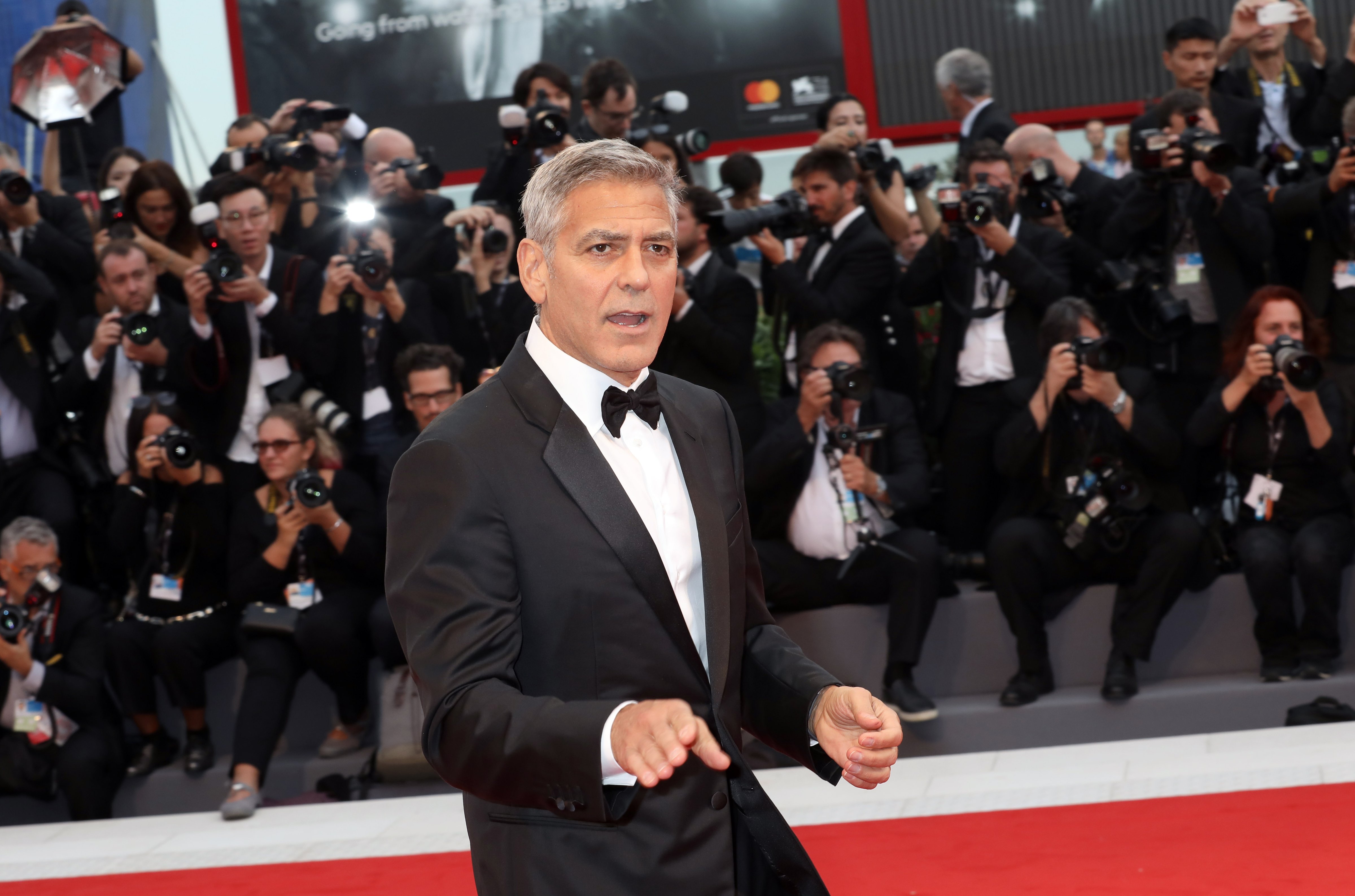 George Clooney walks the red carpet ahead of the 'Suburbicon' screening during the 74th Venice Film Festival at Sala Grande on September 2, 2017 in Venice, Italy. (Photography by Elisabetta A. Villa—WireImage/Getty)