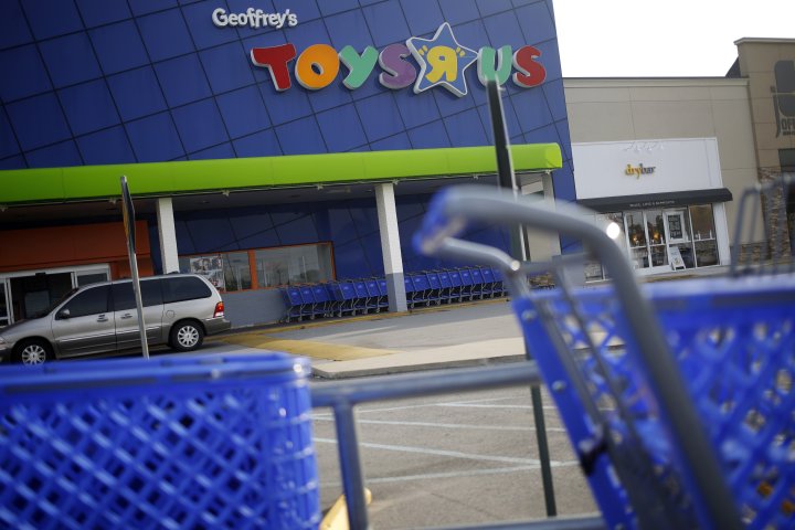Shopping carts stand outside a Toys R Us Inc. retail store in Louisville, Kentucky, U.S., on Monday, Sept. 18, 2017. Toys R Us Inc., which has struggled to lift its fortunes since a buyout loaded the retailer with debt more than a decade ago, is preparing a bankruptcy filing as soon as today, according to people familiar with the situation. (Luke Sharrett/Bloomberg via Getty Images)