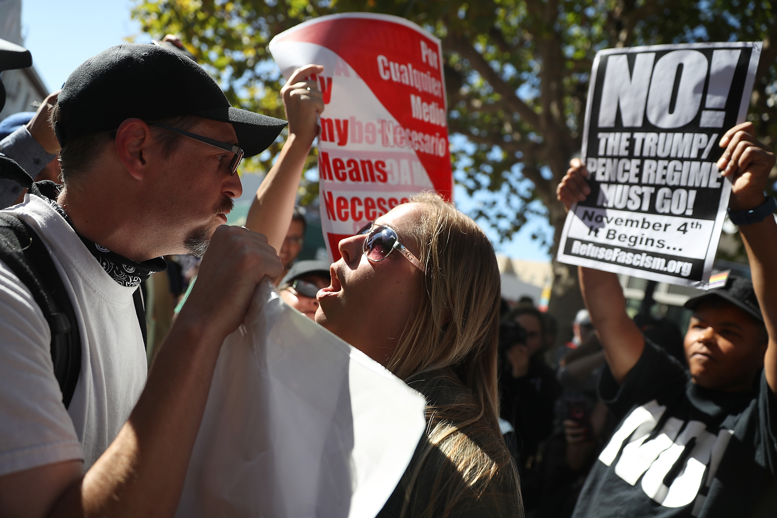 BERKELEY, CA - SEPTEMBER 24:  Protesters shout at each other during a free speech rally with right wing commentator Milo Yiannopoulos at U.C. Berkeley on September 24, 2017 in Berkeley, California. Hundreds of protesters came out to support and demonstrate against Milo Yiannopoulos as he held a free speech rally at U.C. Berkeley.  (Photo by Justin Sullivan/Getty Images) (Justin Sullivan—Getty Images)