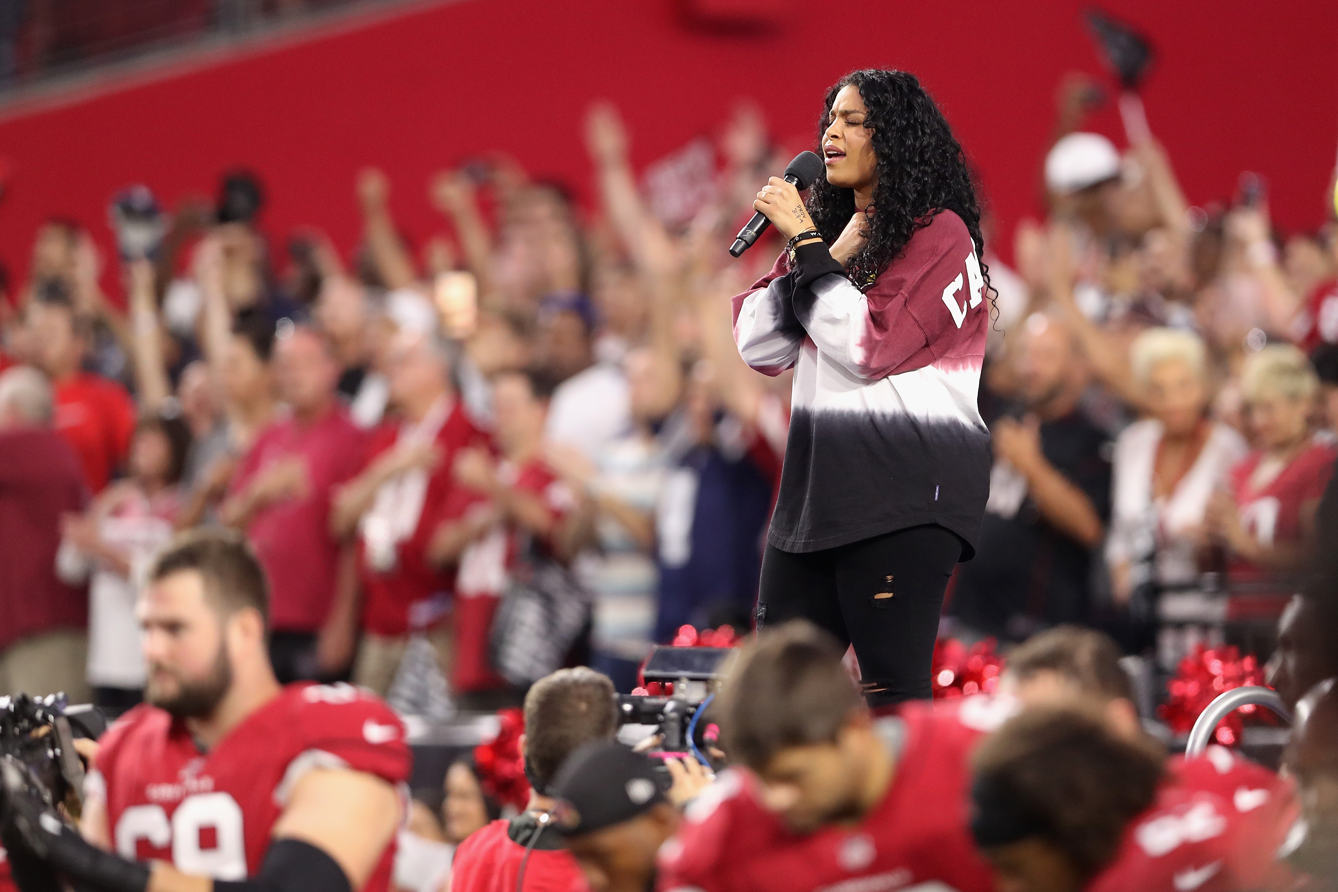 GLENDALE, AZ - SEPTEMBER 25:  Singer Jordin Sparks performs the National Anthem before the start of the  the NFL game between the Arizona Cardinals and the Dallas Cowboys at the University of Phoenix Stadium on September 25, 2017 in Glendale, Arizona.  (Photo by Christian Petersen/Getty Images) (Christian Petersen&mdash;Getty Images)